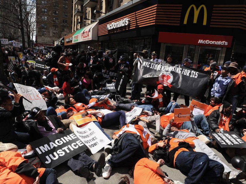 Thousands of McDonald's workers joined a global “day of action” demanding higher wages