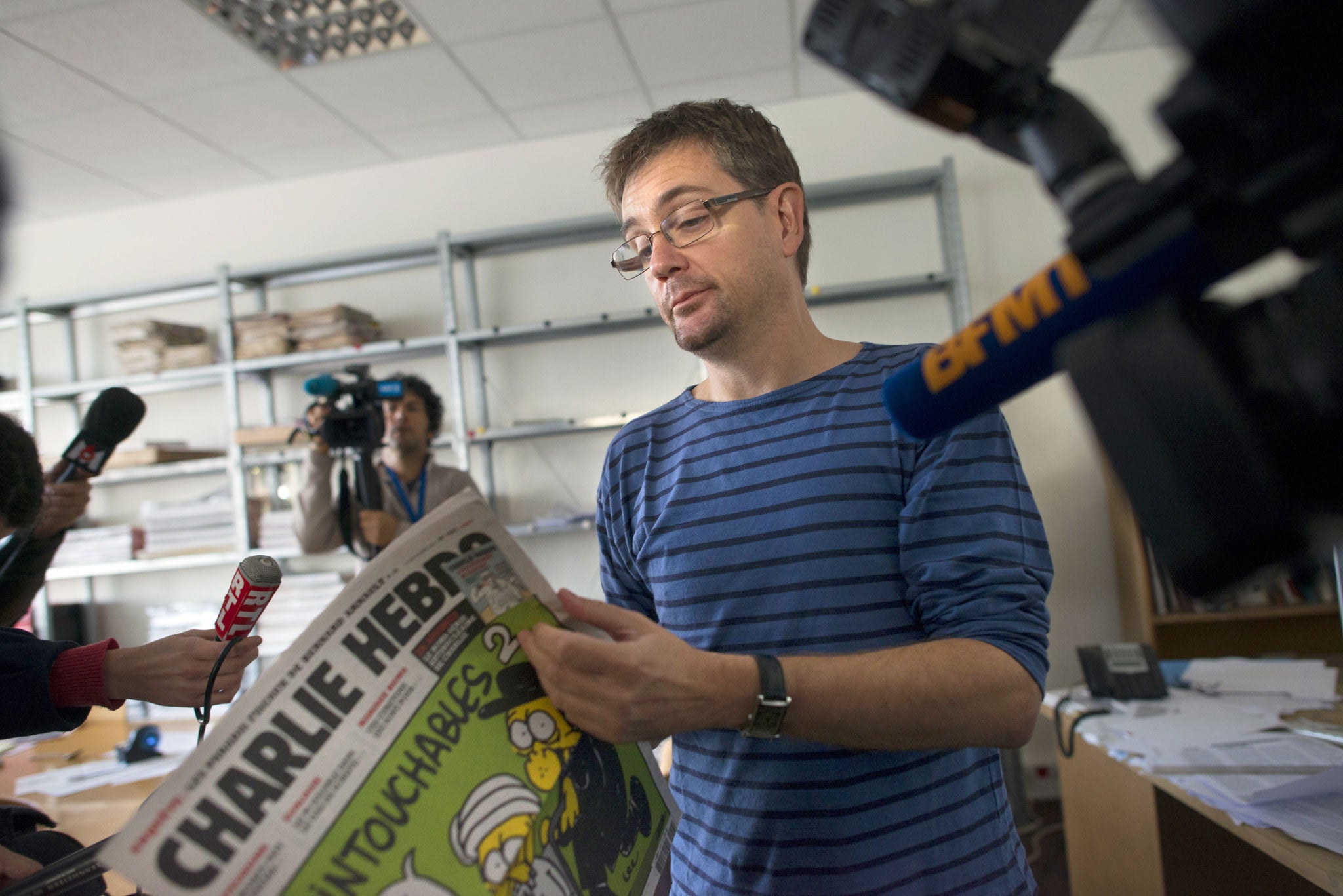 French satirical weekly Charlie Hebdo's publisher, Stéphane Charbonnier, known as Charb, at the magazine's headquarters in Paris on 19 September 2012.