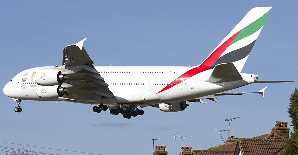 An Emirates Airbus A380 aircraft comes into lane at Heathrow Airport