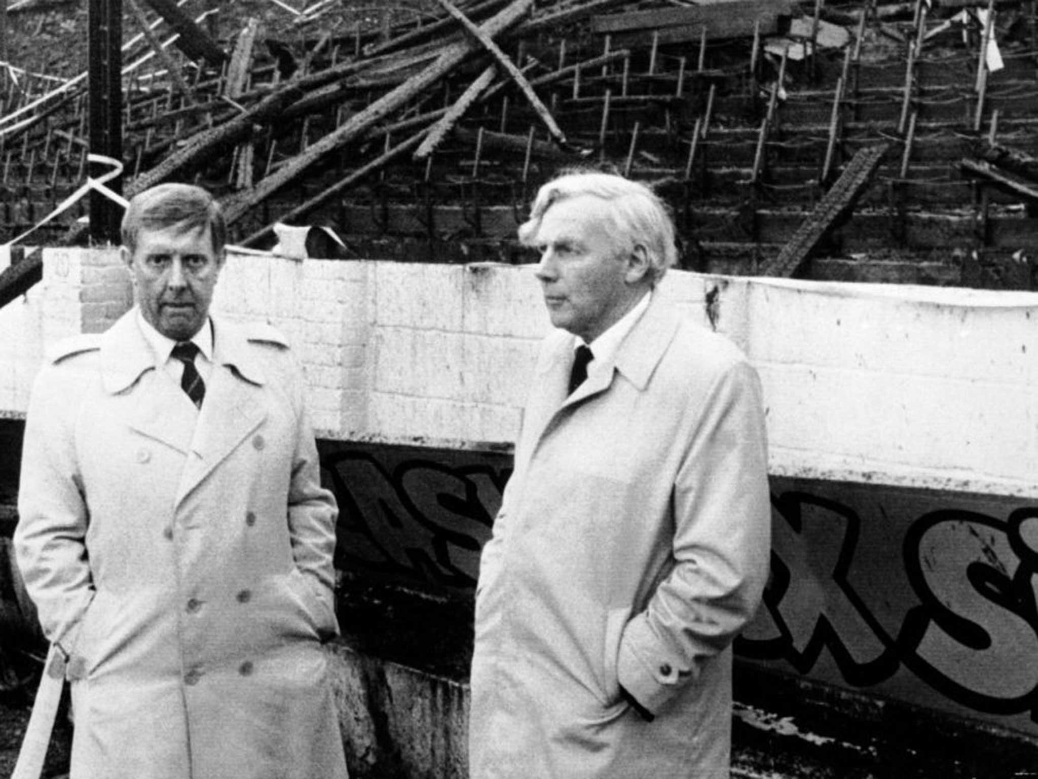 Bradford City FC chairman Stafford Heginbotham (left) with Mr Justice Popplewell, in front of the stand which was burnt at Bradford’s Valley Parade ground in 1985