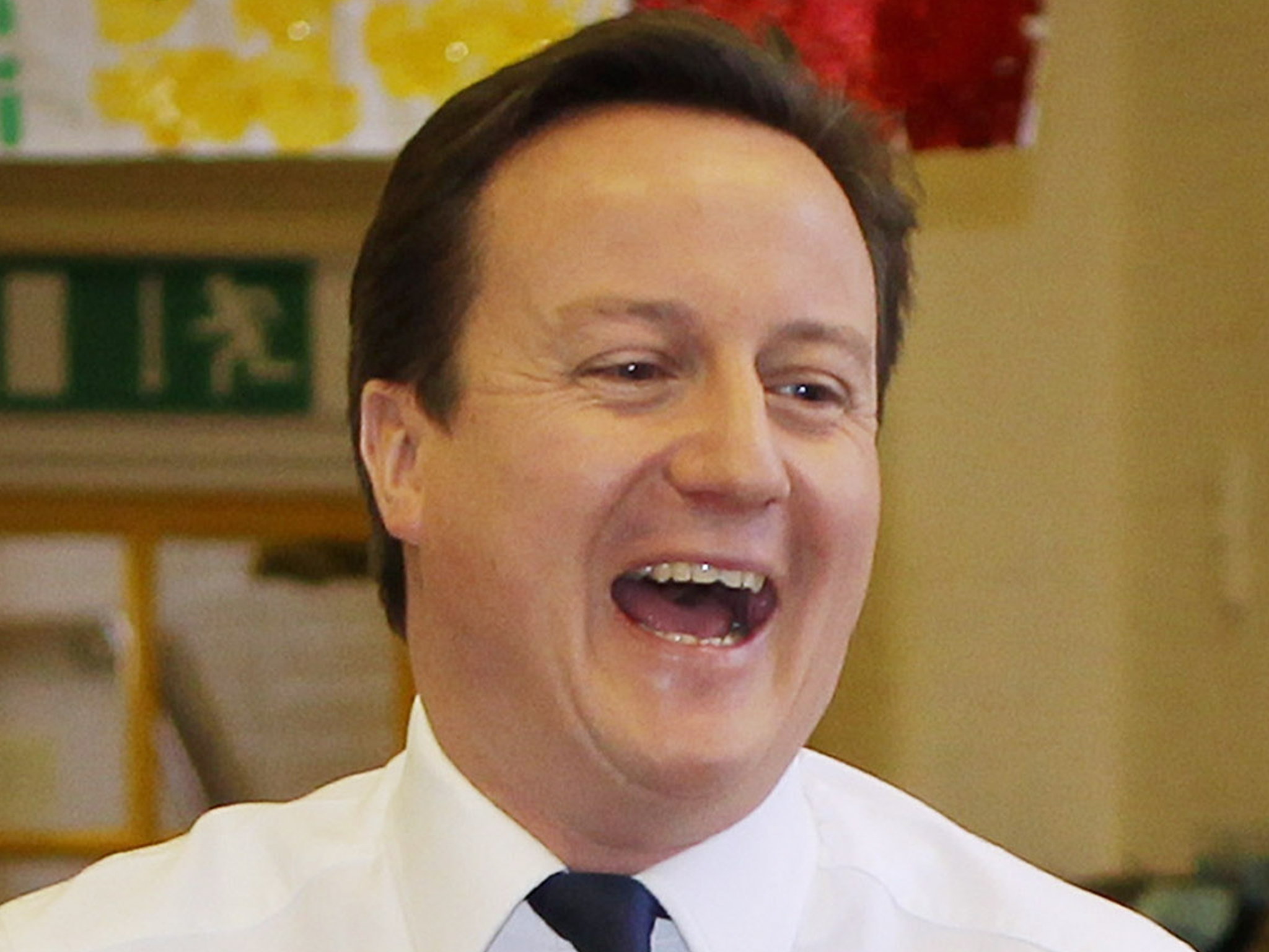 David Cameron laughs while maintaining his usual sexy demeanour