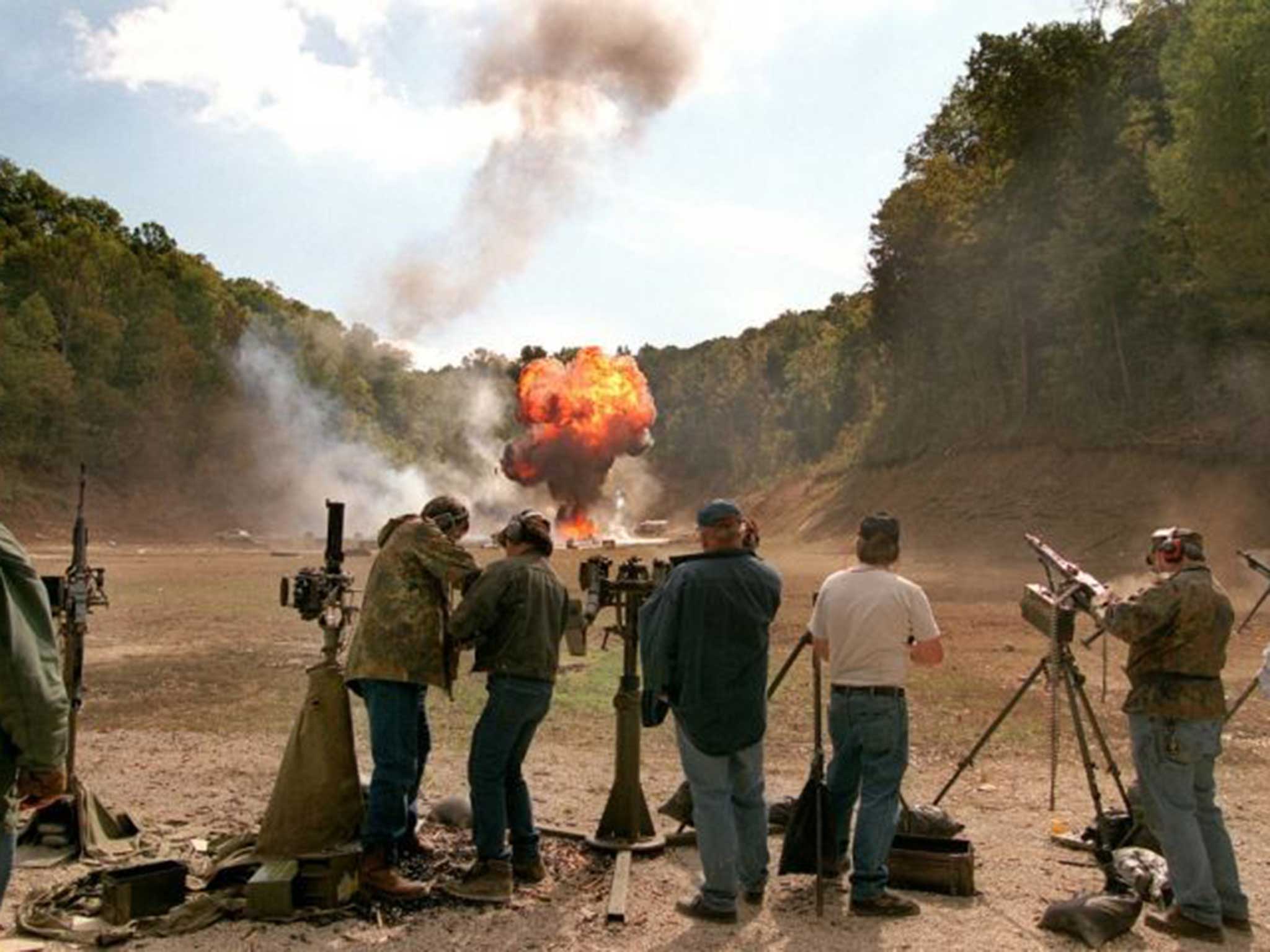 Contestants hit targets filled with explosives at Knob Creek, which attracts 10,000 gun enthusiasts