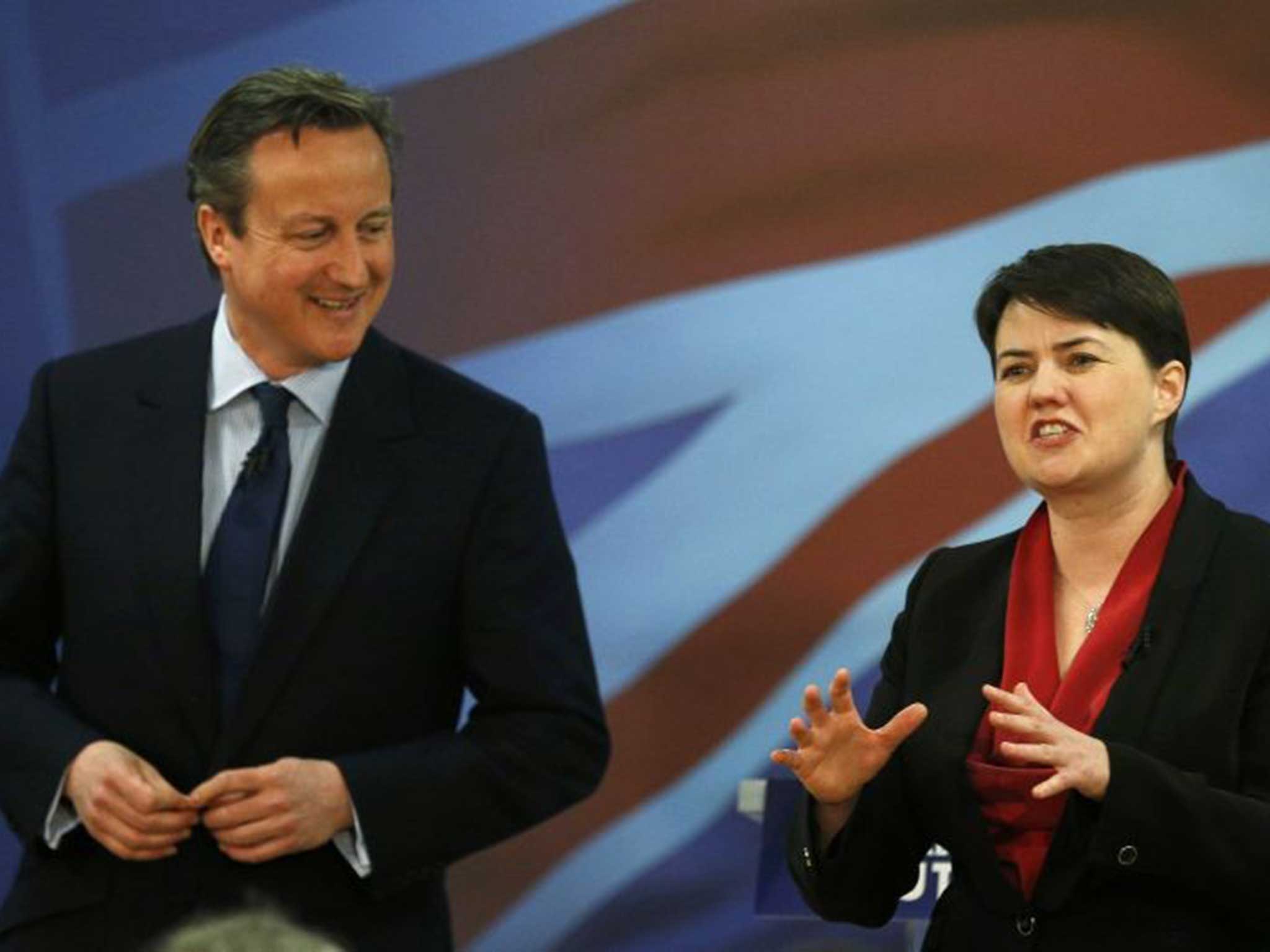Prime Minister David Cameron listens to Scottish Conservative Leader Ruth Davidson at the launch of the Scottish Conservative manifesto