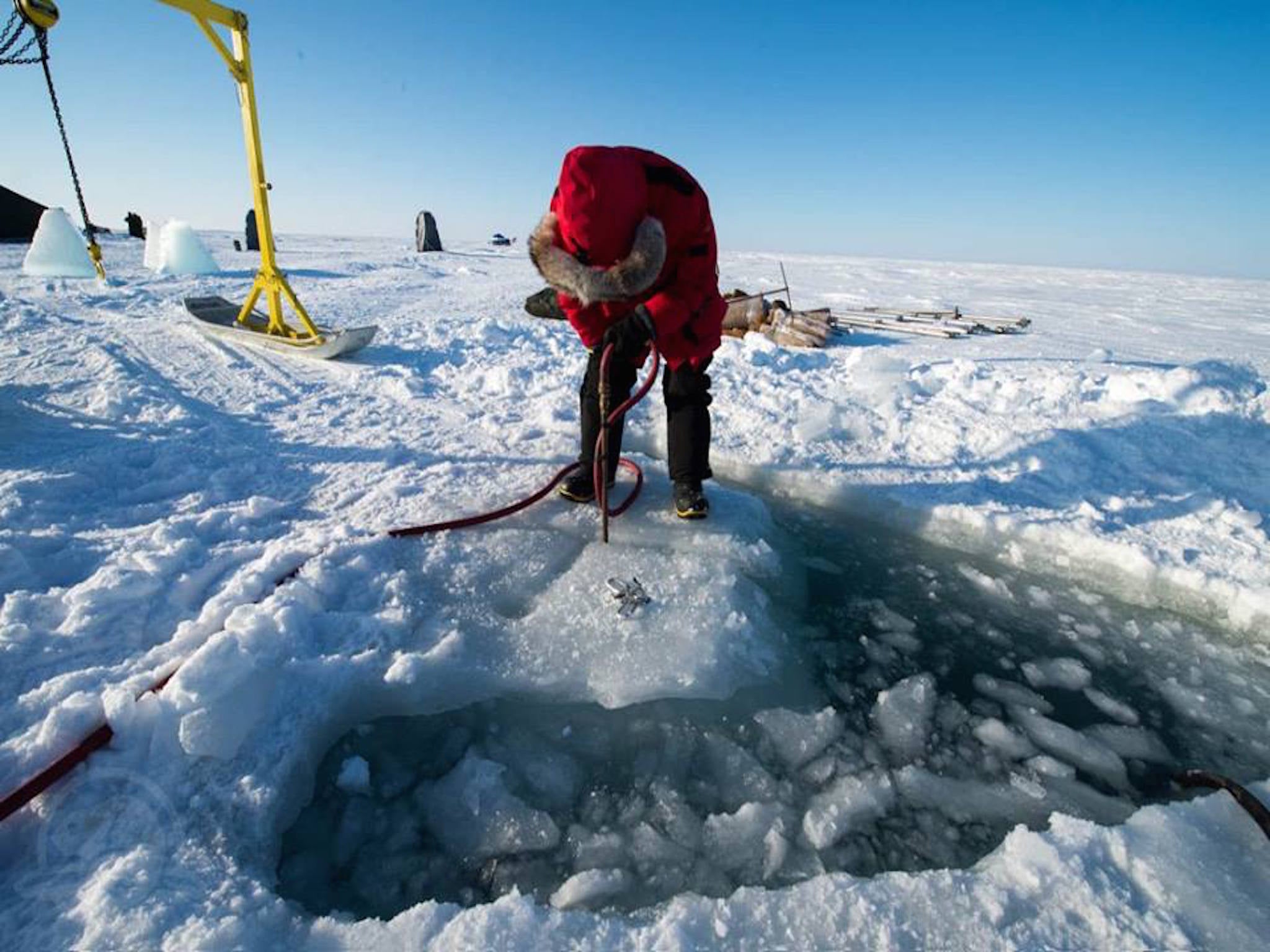 Divers preparing the ice to search HMS Erebus