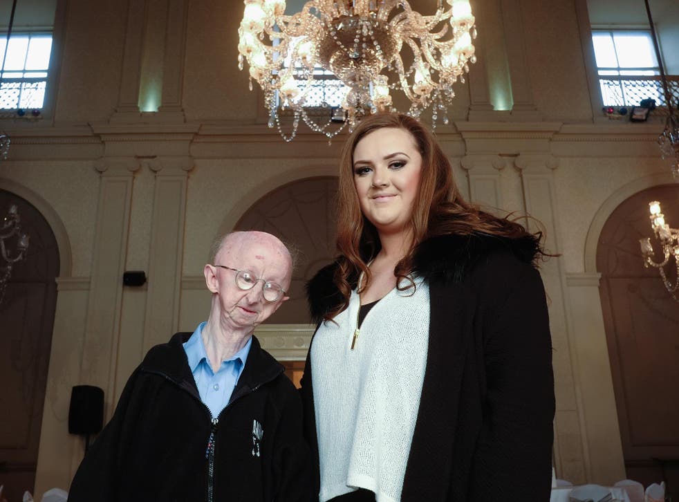 Alan Barnes with Katie Cutler, the woman who helped him raise over £330,000 after a mugging left him with a broken collarbone