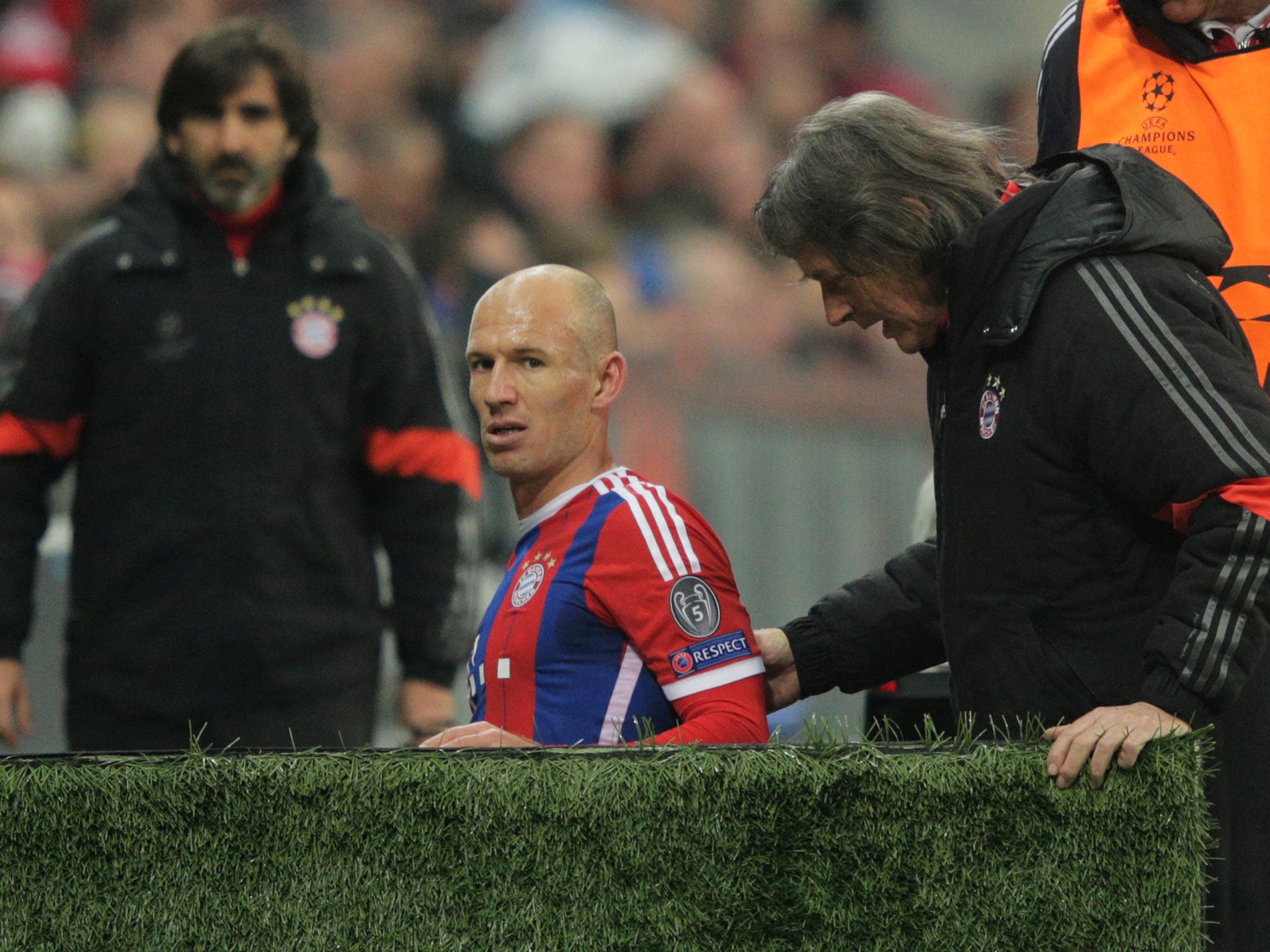 Müller-Wohlfahrt with Arjen Robben