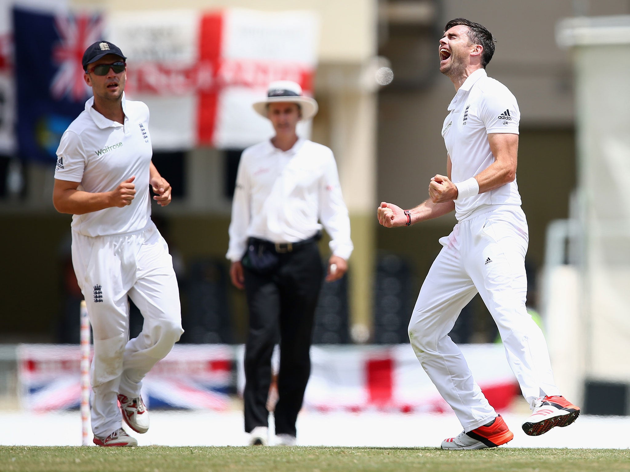 James Anderson celebrates after equalling Ian Botham's wicket record for England