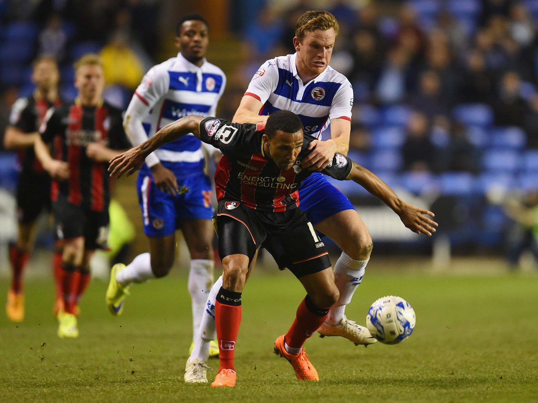 Callum Wilson of Bournemouth is challenged by Alex Pearce