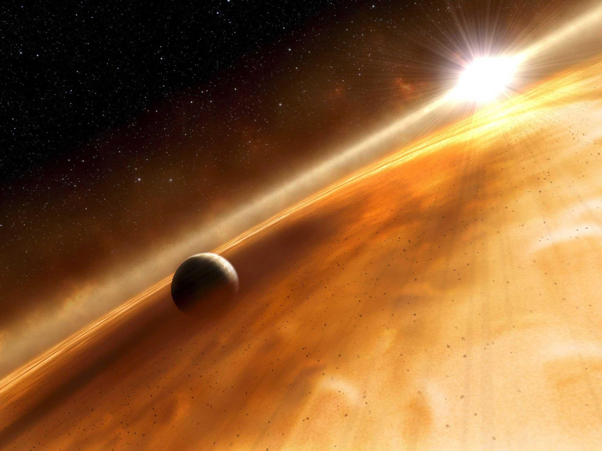 Artist's concept of the star Fomalhaut and the Jupiter-type planet that the Hubble Space Telescope observed.