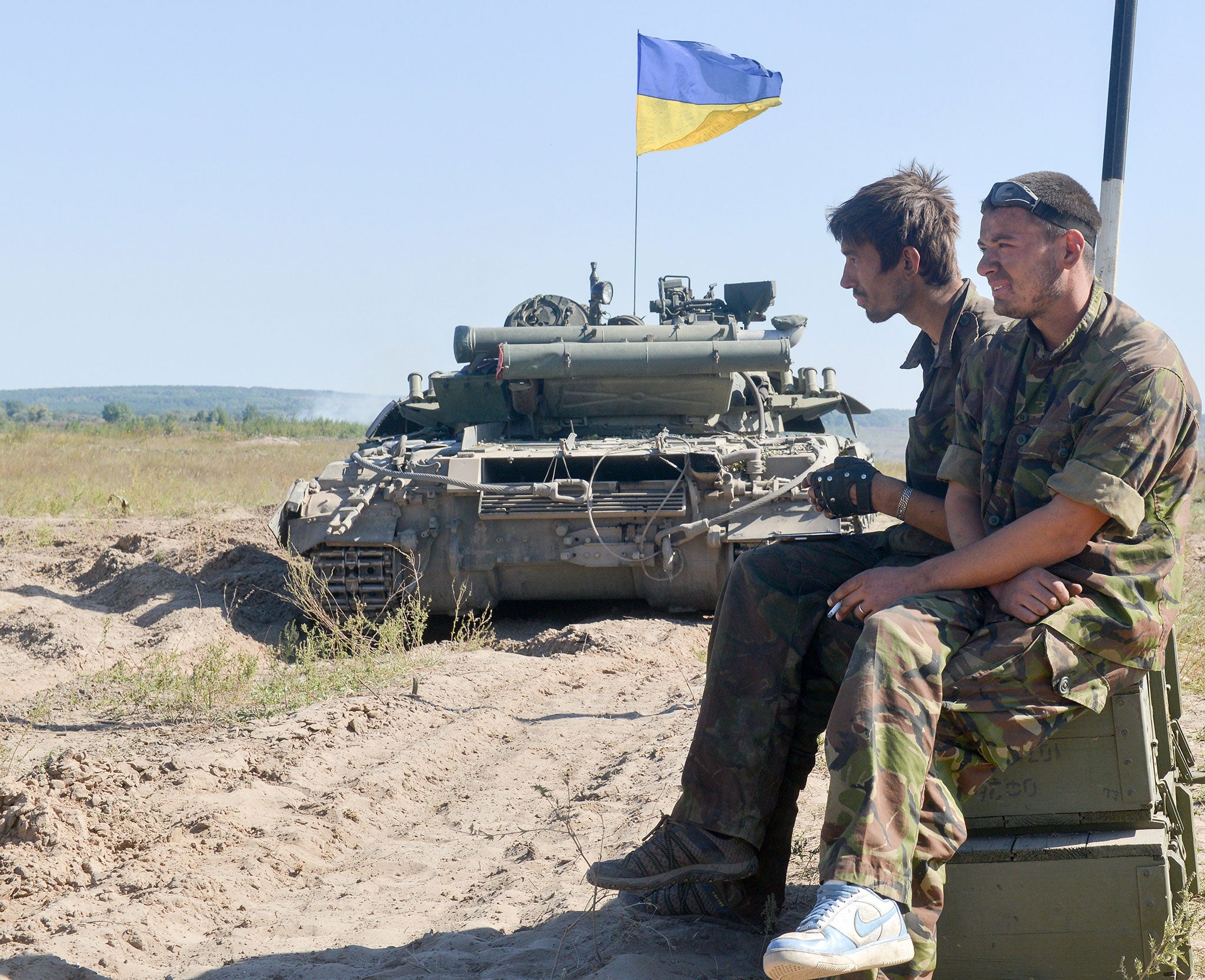 Ukraine National Guard soldiers take part in a drill on a firing ground in the Kharkiv region on 18 September 2014.