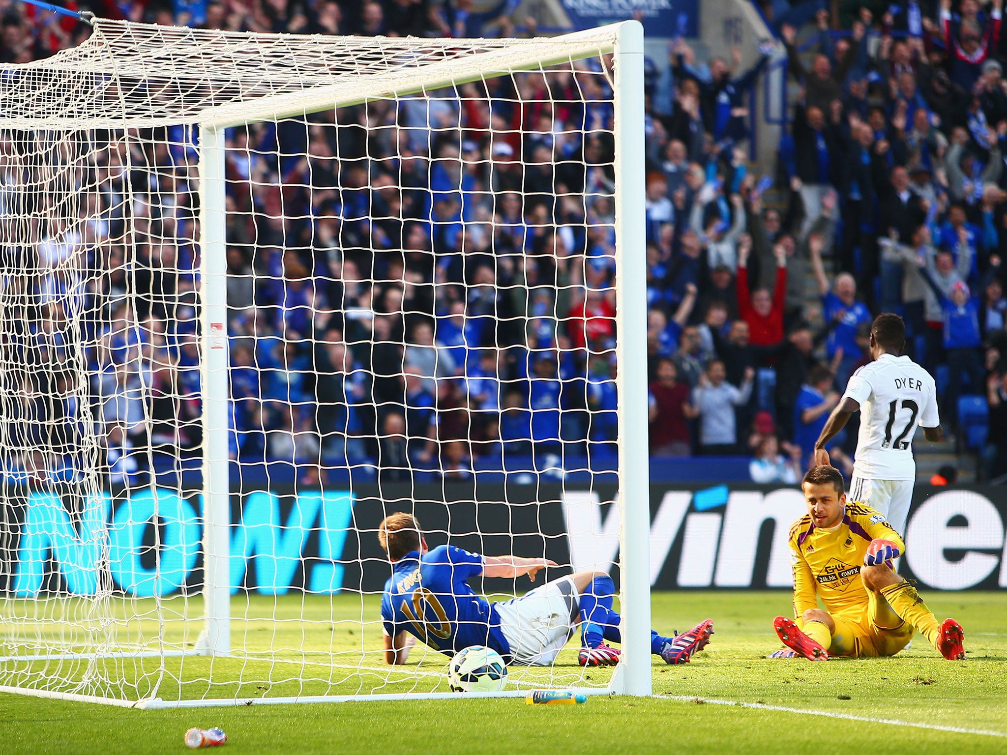 Andy King bundles the ball over the line for Leicester's second