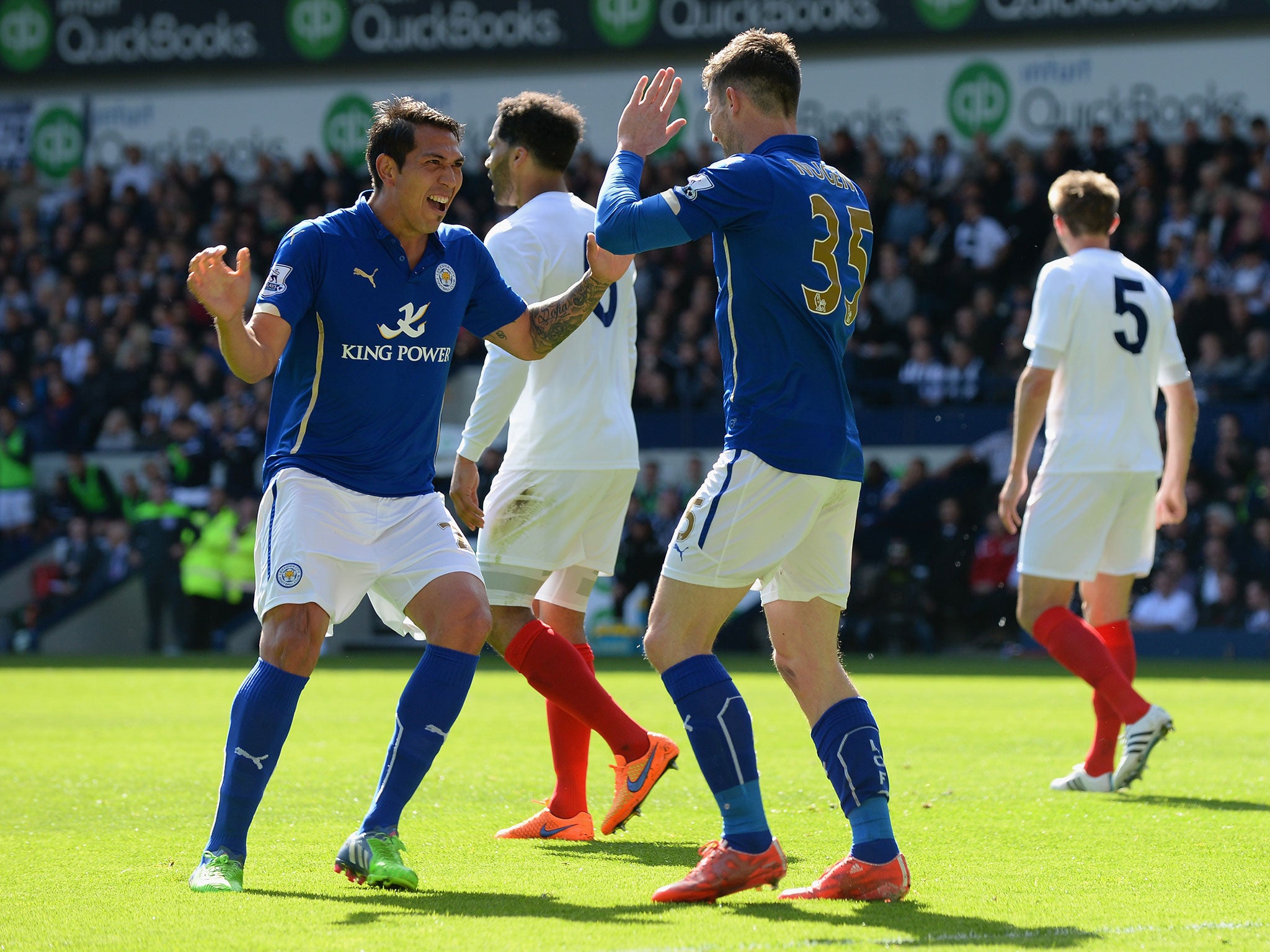 Leonardo Ulloa celebrates after scoring to put Leicester ahead