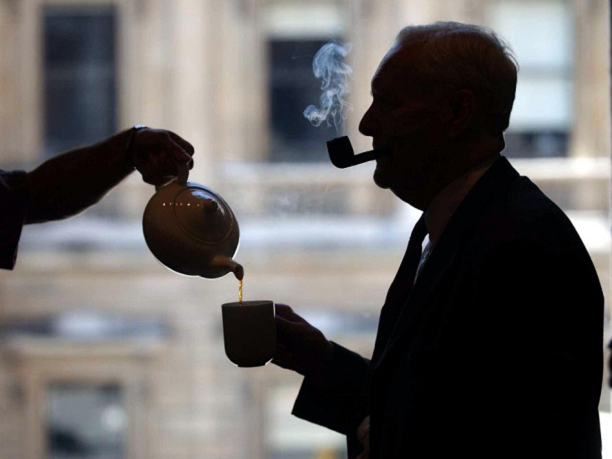 Tony Benn enjoying a cup of tea