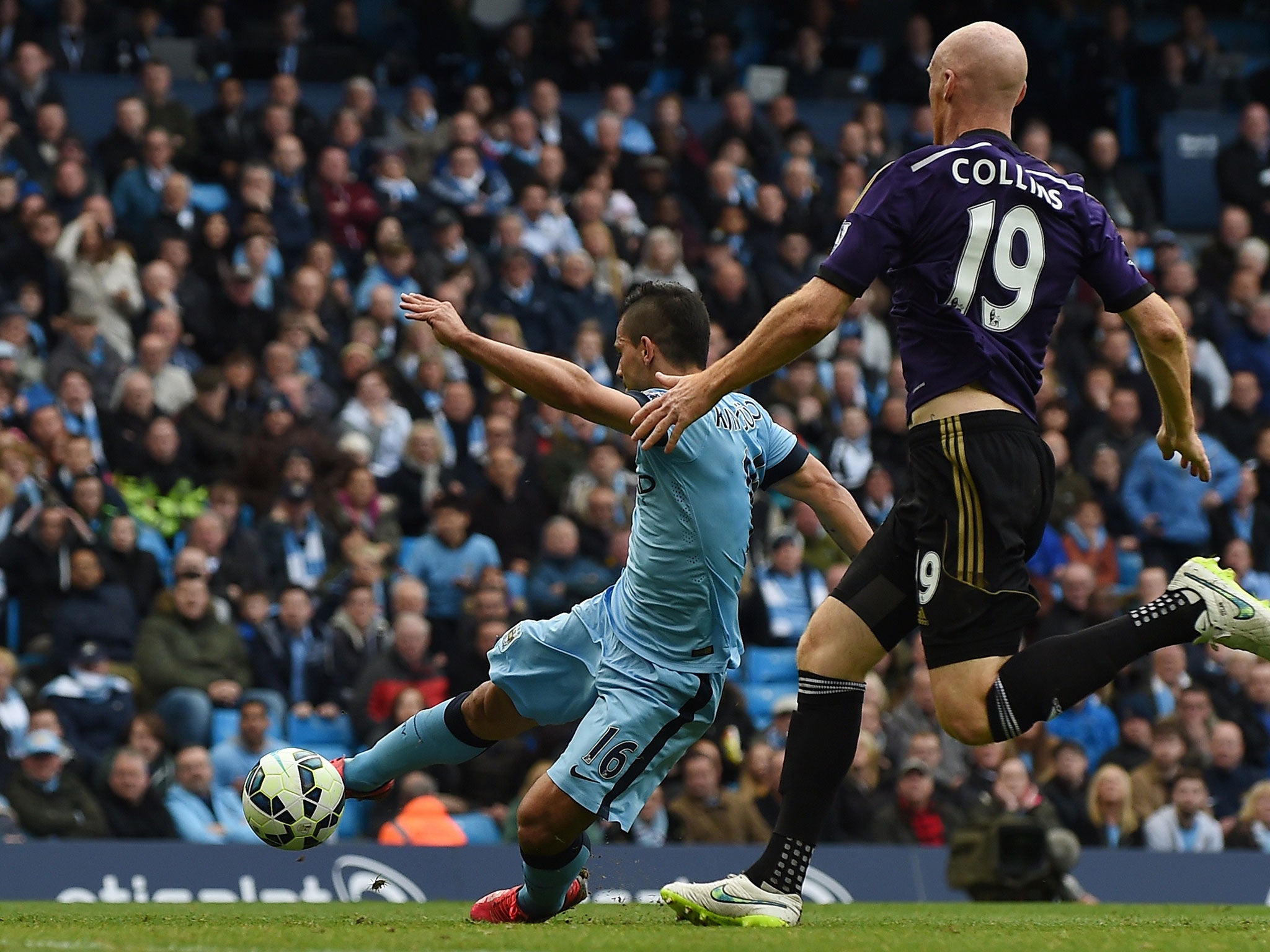 Sergio Aguero completes a fine move to score City's second