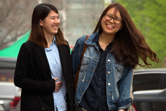Chinese activist Li Tingting, left, with her girlfriend ‘Teresa’. Ms Li says her activism has grown only stronger after spending 37 days in detention
