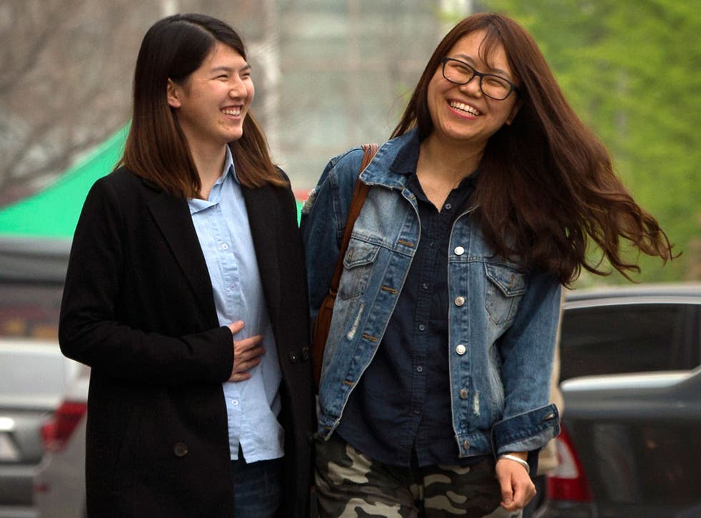 Chinese activist Li Tingting, left, with her girlfriend ‘Teresa’. Ms Li says her activism has grown only stronger after spending 37 days in detention