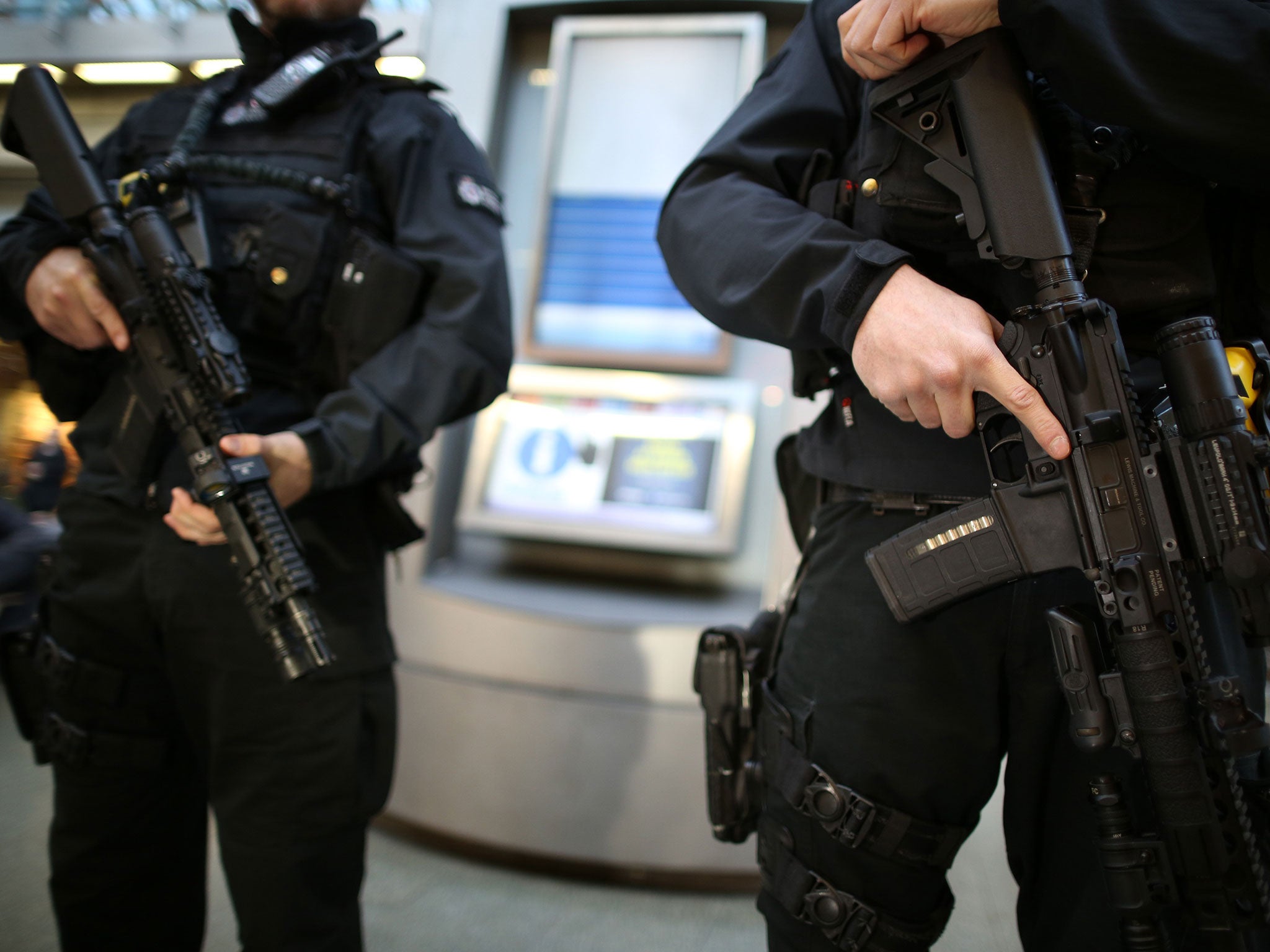 Armed British Transport Police officers patrol the Eurostar platforms at St Pancras railway station on January 8, 2015 in London, United Kingdom