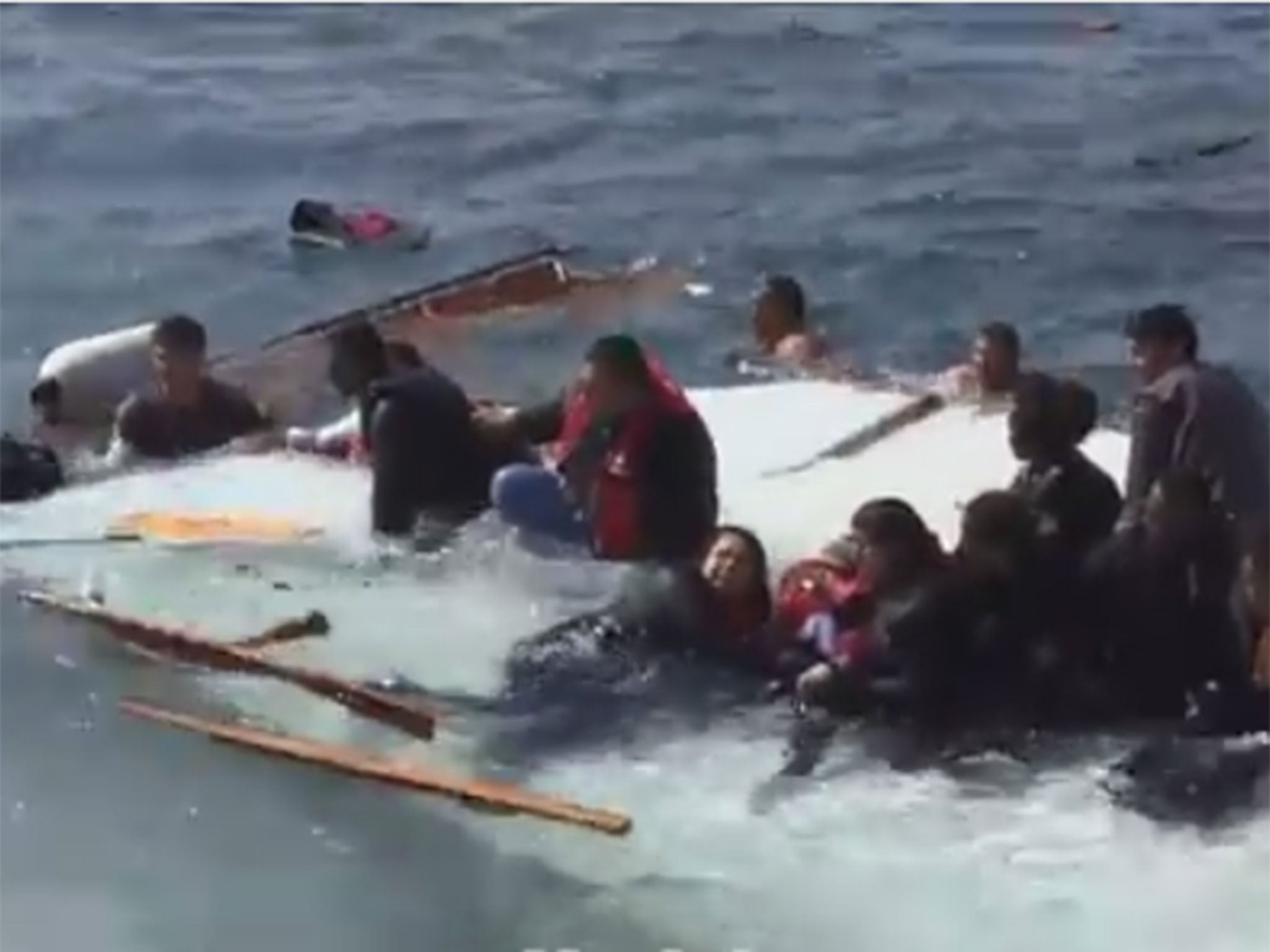 Dozens were rescued by Greek coast guards as the ship ran aground off Rhodes