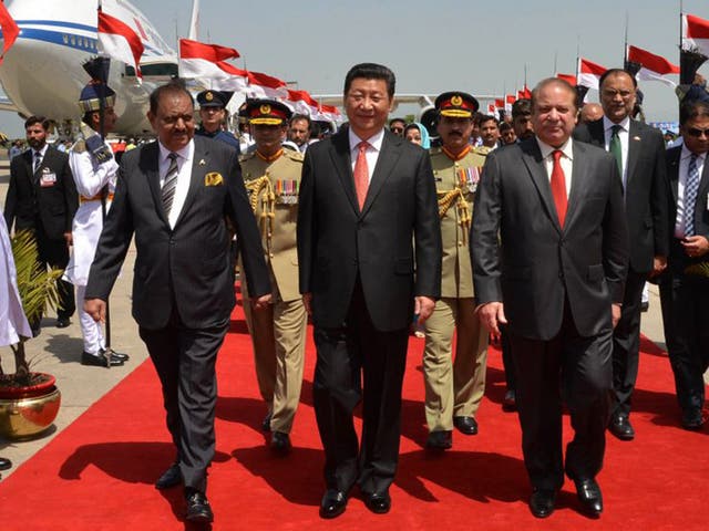 President Xi Jinping, centre, arrived in Rawalpindi on Monday to announce the ‘One Belt’ project