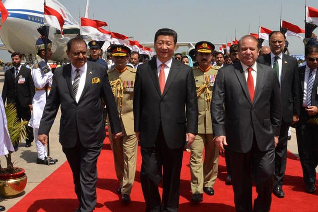 President Xi Jinping, centre, arrived in Rawalpindi on Monday to announce the ‘One Belt’ project