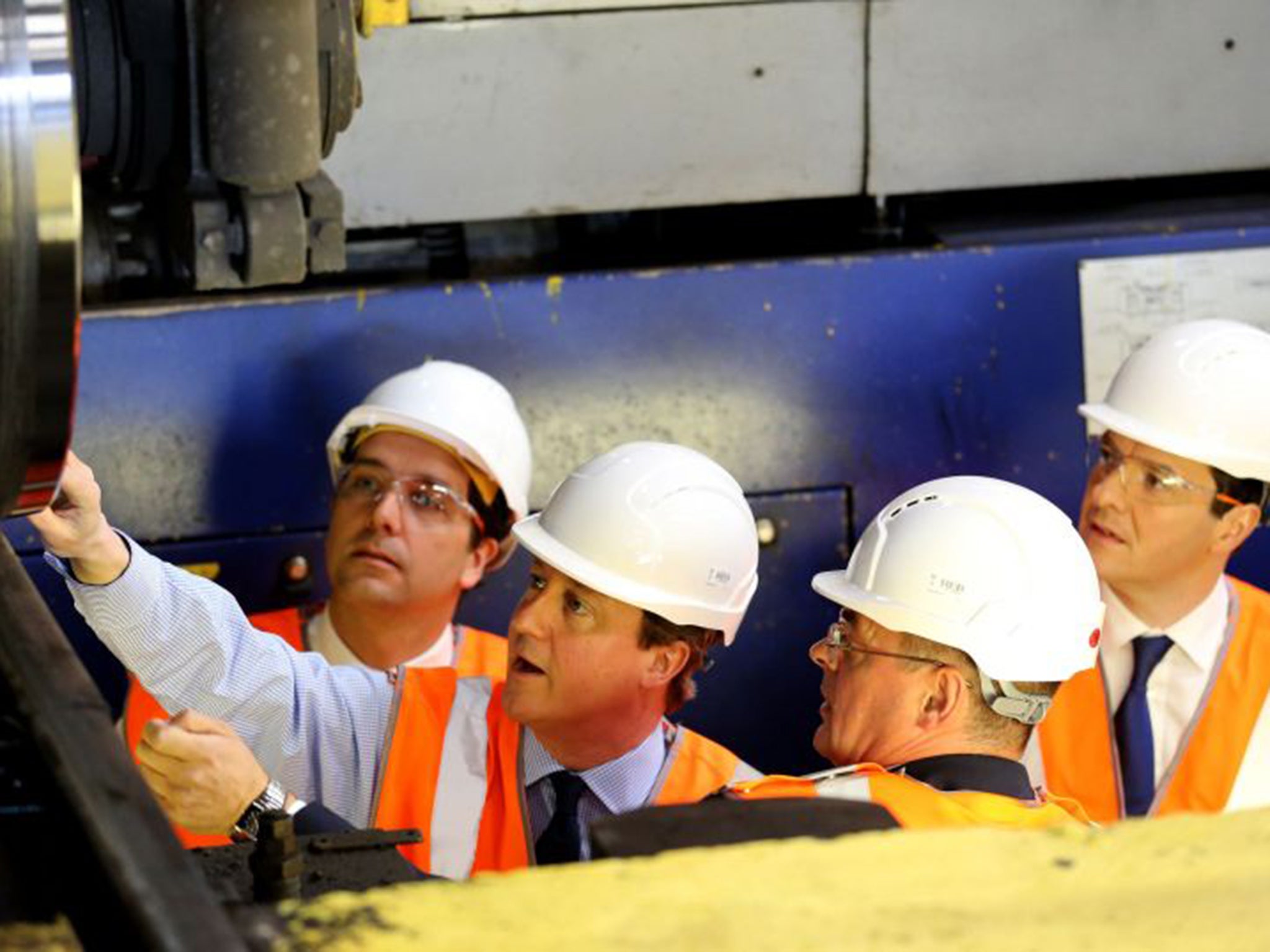All campaigning and no investing... Prime Minister David Cameron and Chancellor George Osborne at Arriva TrainCare in Crewe on Monday