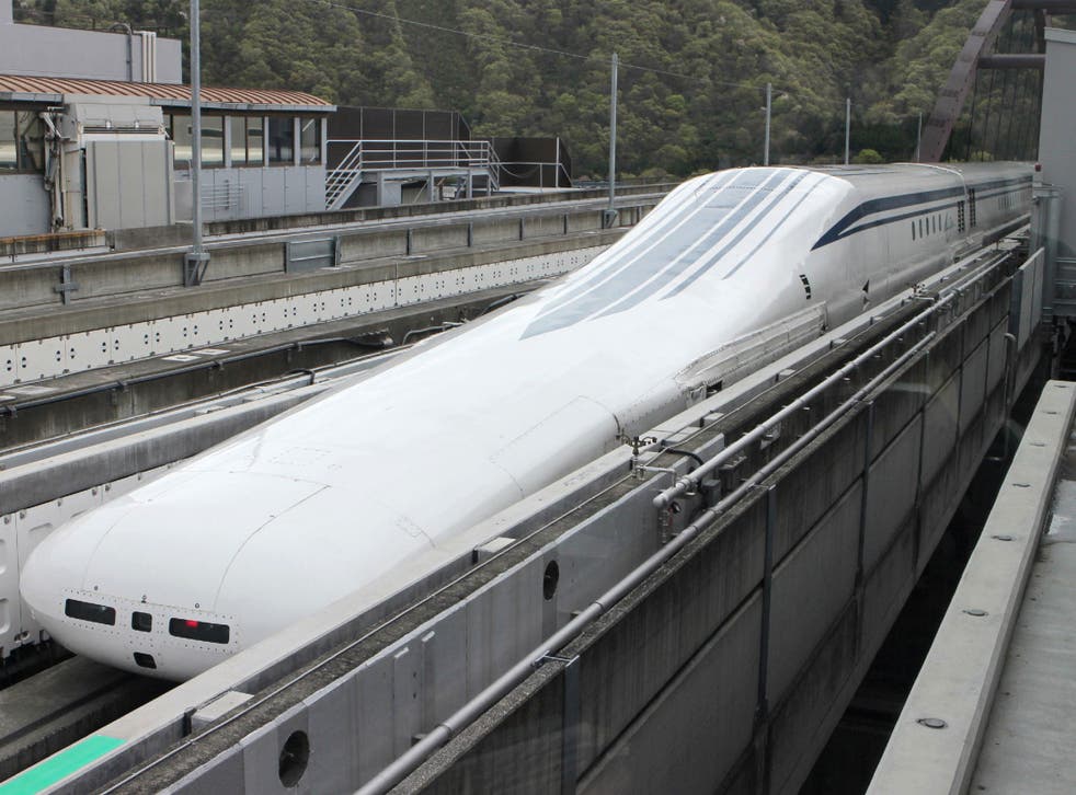 The seven-car maglevtrain returns to the station after setting a new world speed record in a test run near Mount Fuji, clocking more than 600 kilometres (373 miles) an hour 