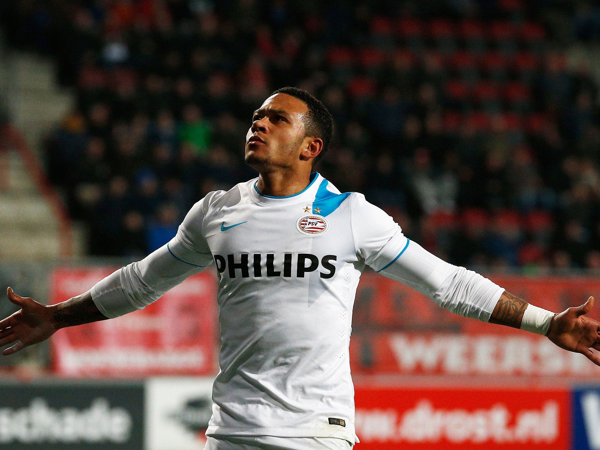 Memphis Depay will join Manchester United for £25m