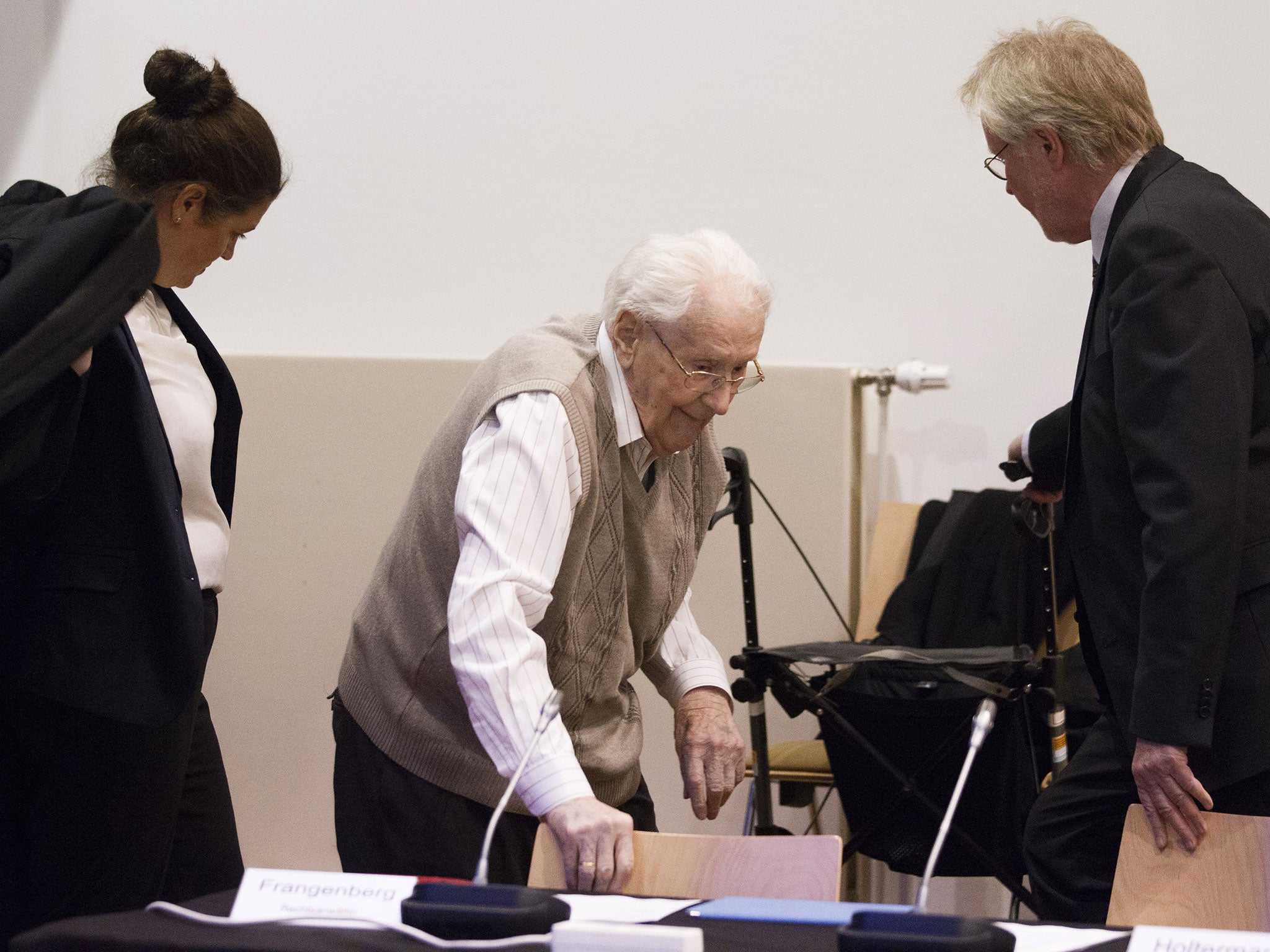 Oskar Groening, 93, arrives for the first day of his trial to face