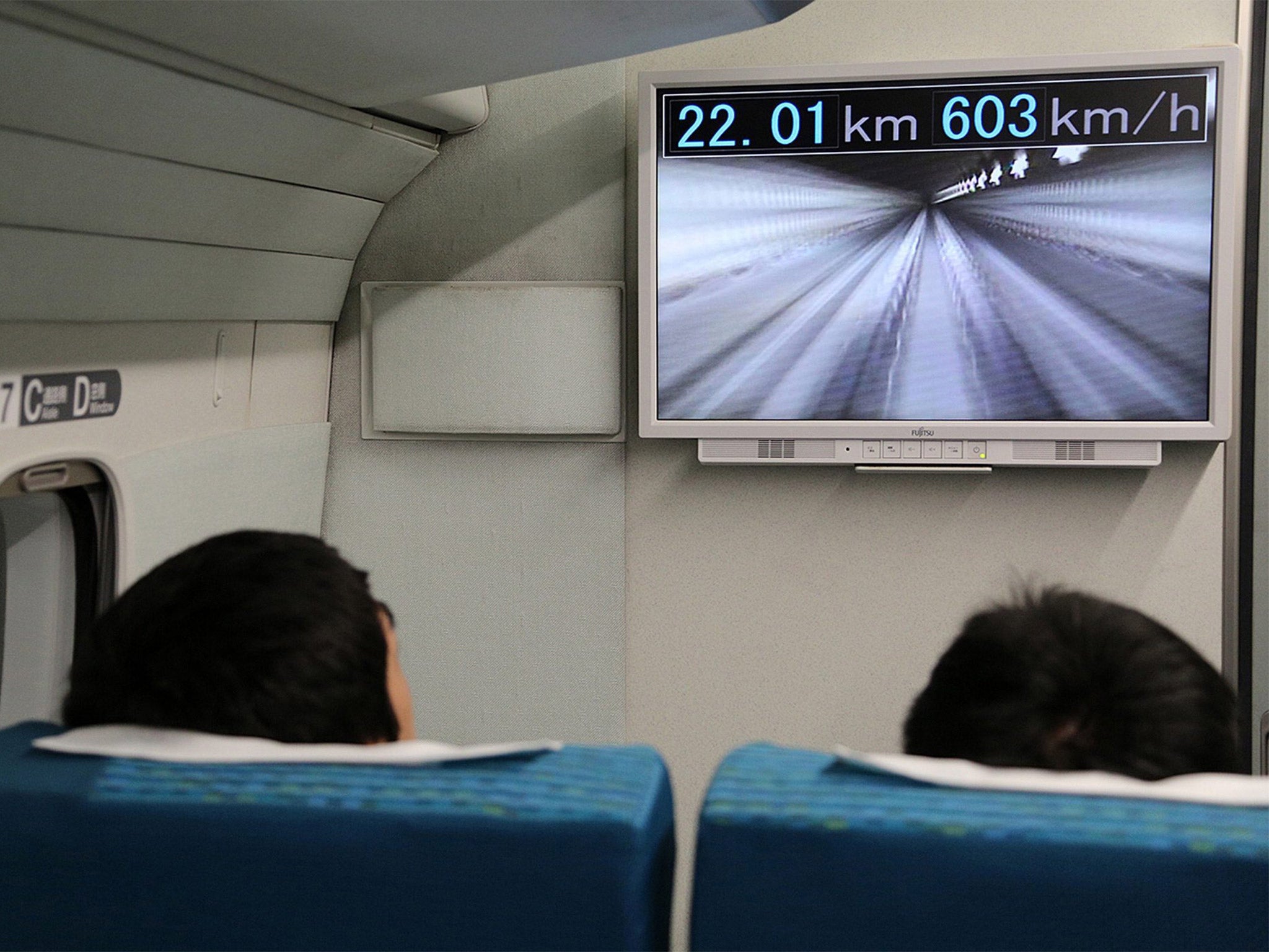 A screen displays the train's speed to its passengers