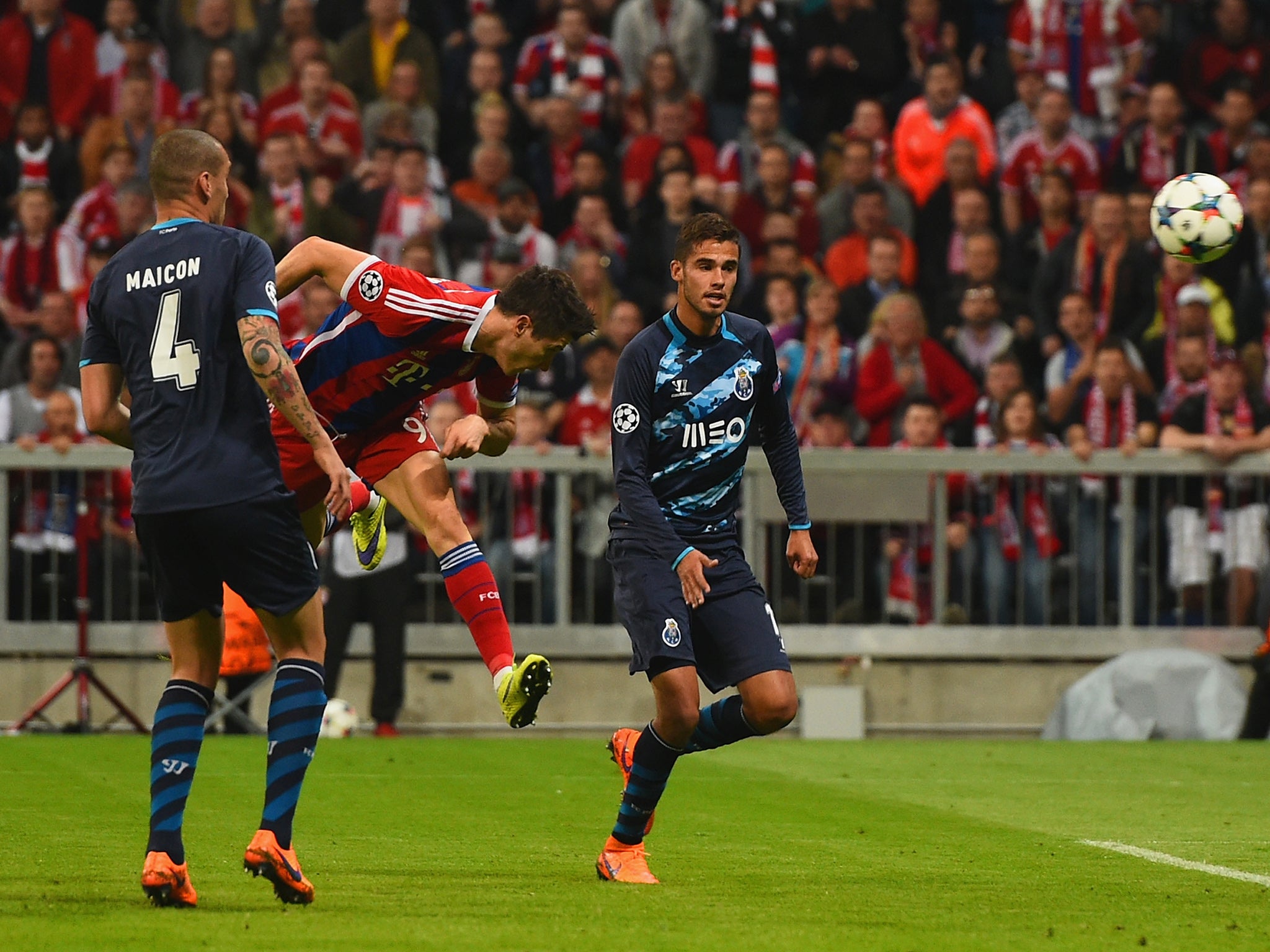 Robert Lewandowski heads home the first of his two goals