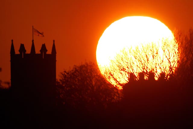 The sun balances next to St Albans Church in Earsdon, North Tyneside.