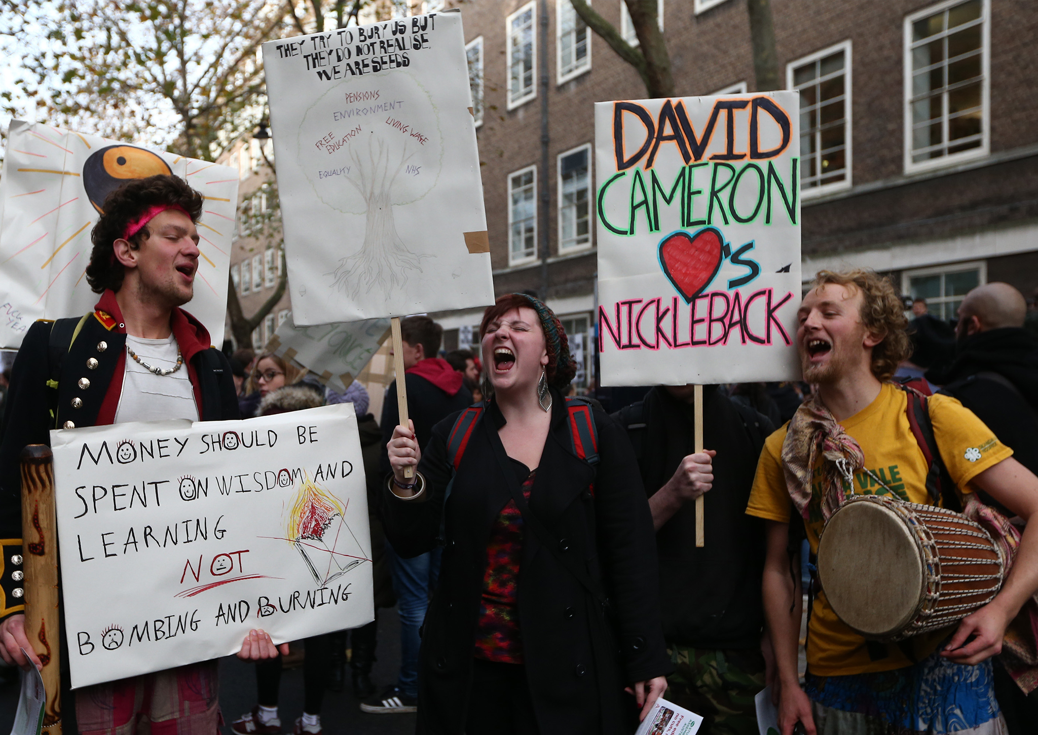 Students take part in a protest march against fees and cuts in the education system