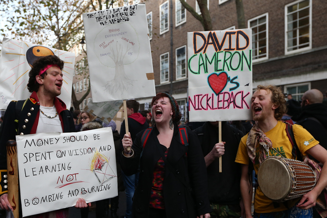 Students take part in a protest march against fees and cuts in the education system