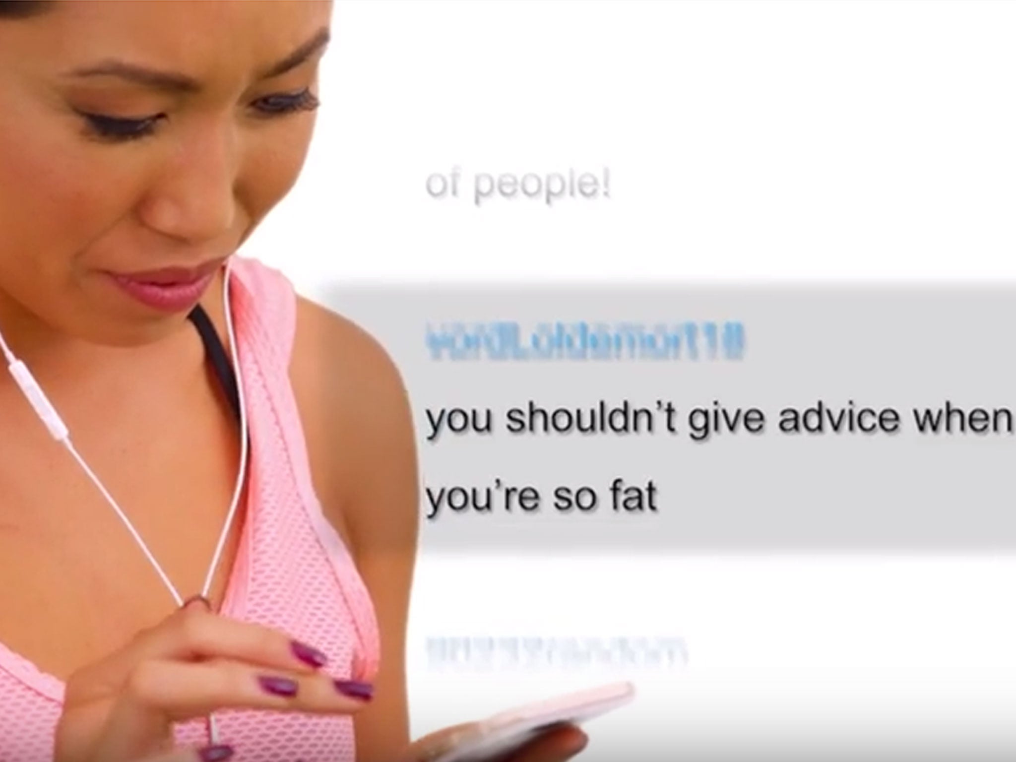 Cassey Ho reads hurtful comments about her body in The 'Perfect' Body video (Image: YouTube/Blogilates)
