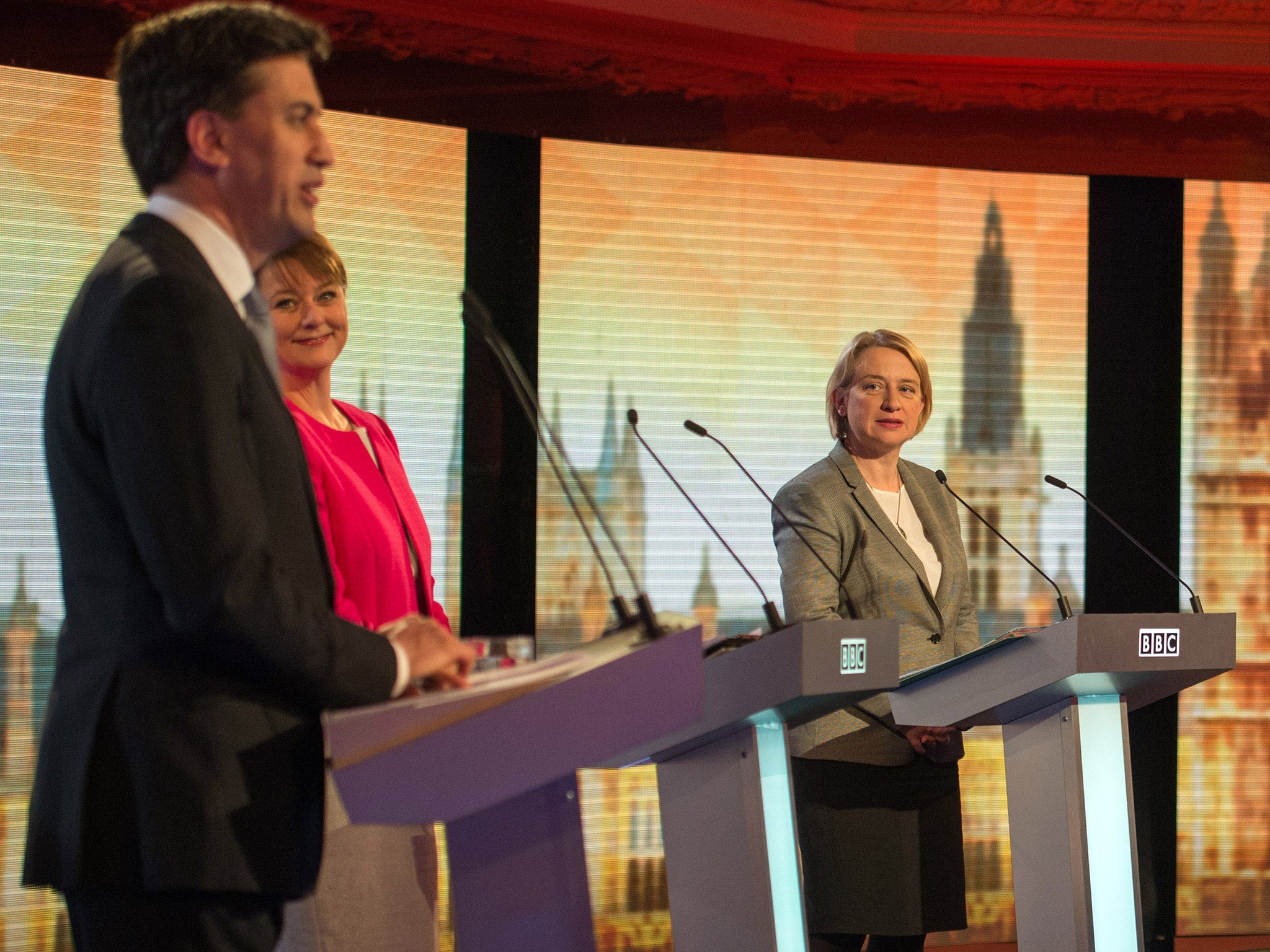 Natalie Bennett listens to Ed Miliband during last week's BBC debate (Getty)