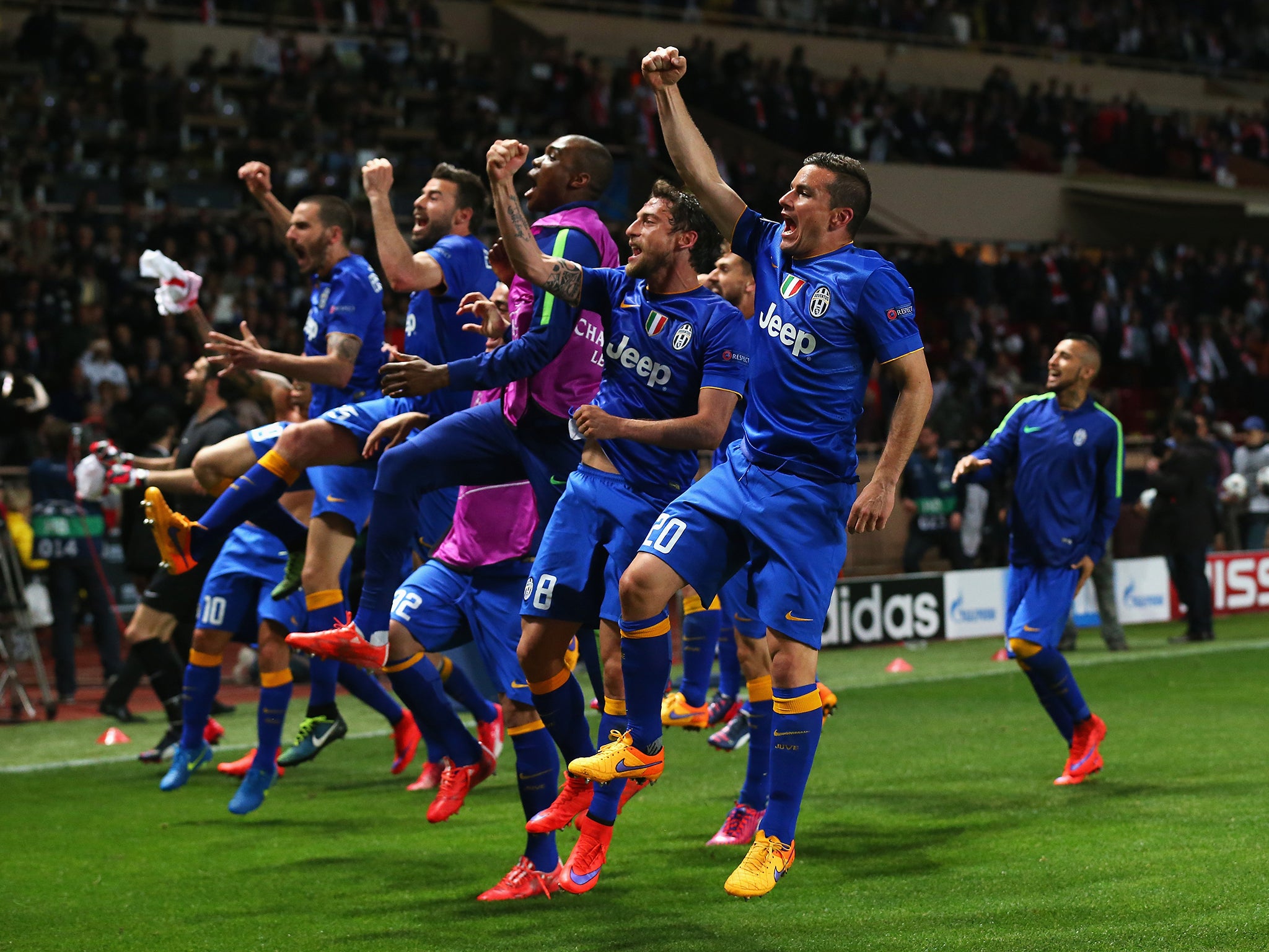 Juventus celebrate after advancing in the Champions League