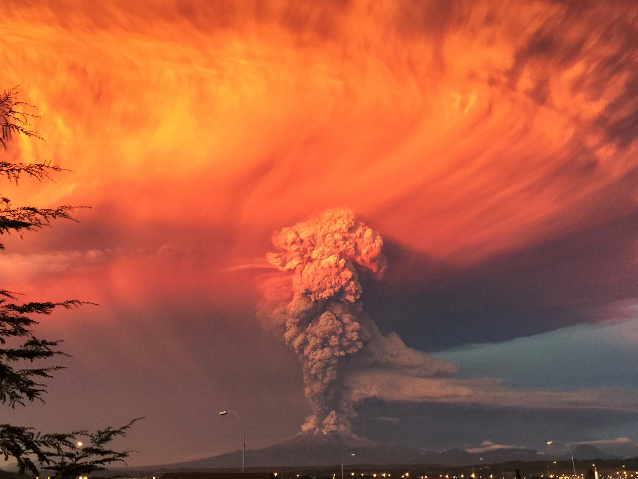 Smoke and ash rise from the Calbuco volcano as seen from the city of Puerto Montt
