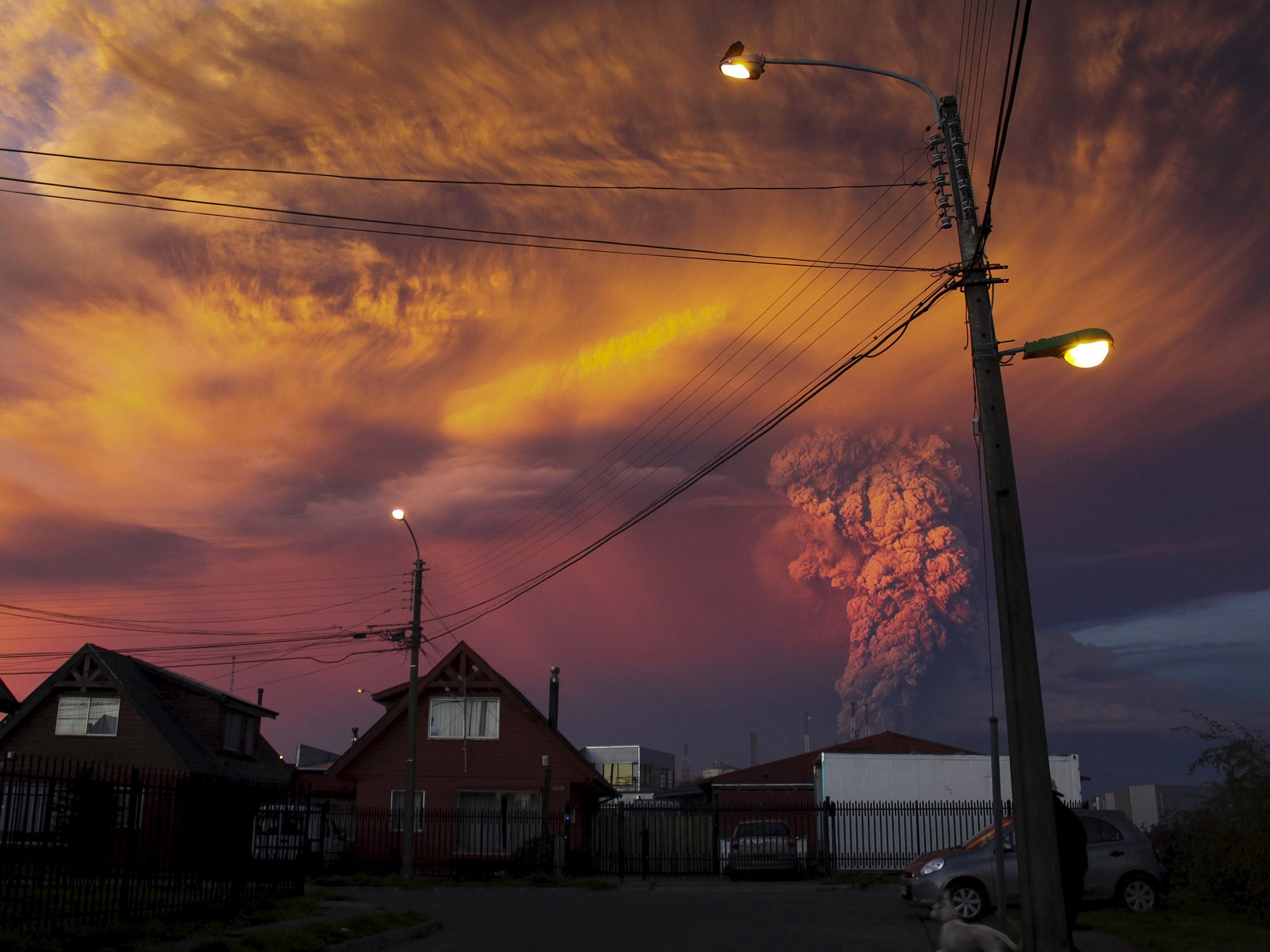 Smoke and ash rise from the Calbuco volcano as seen from the city of Puerto Montt