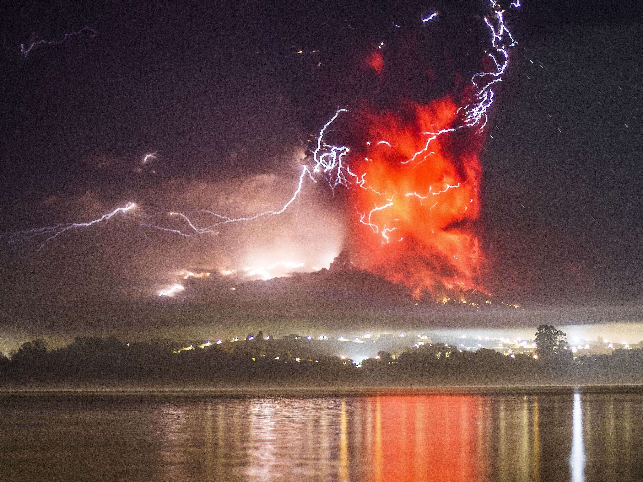 A high column of ash and lava spewing from the Calbuco volcano