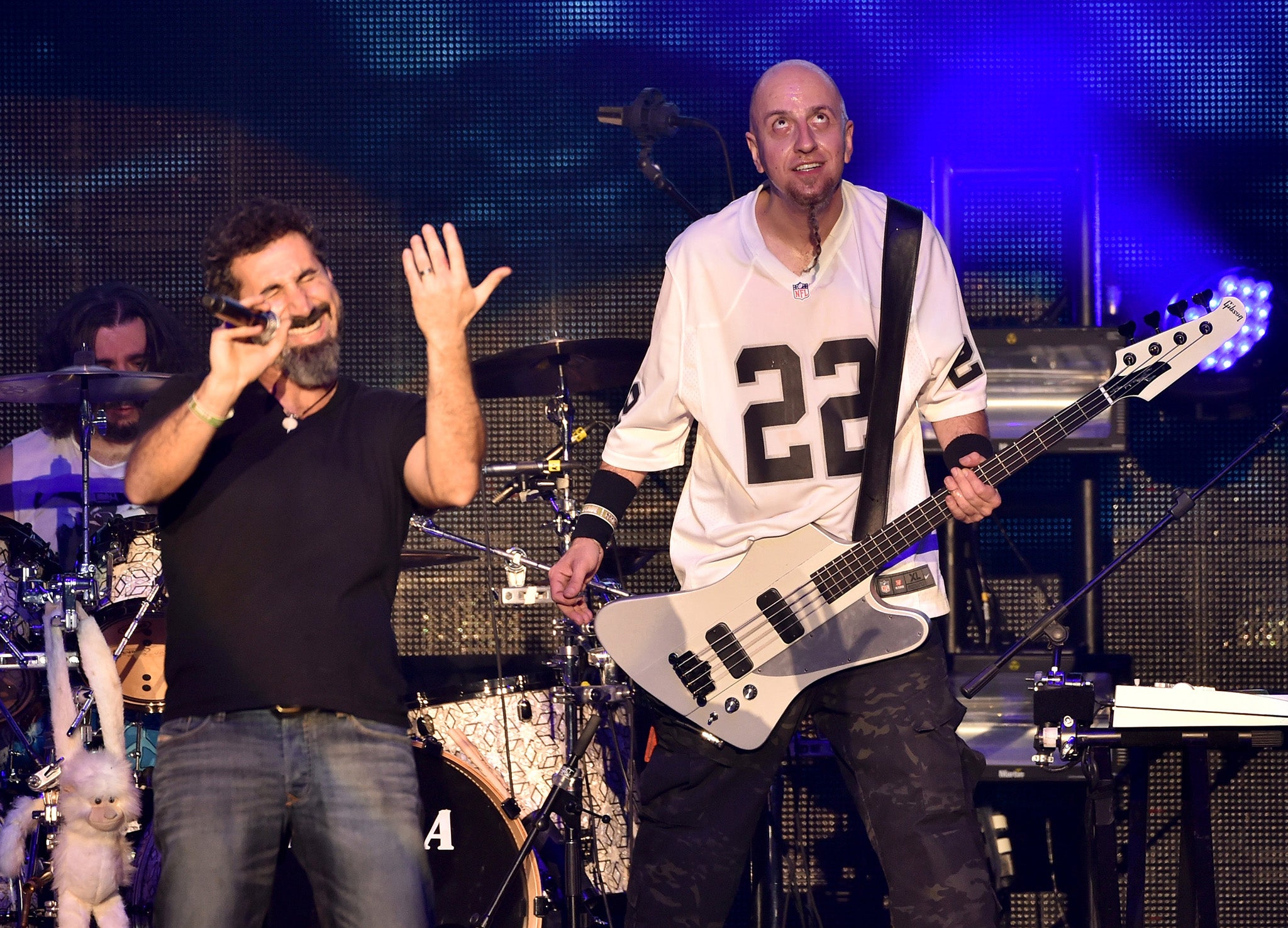 Musicians Serj Tankian and Shavo Odadjian (R) of System of a Down perform onstage