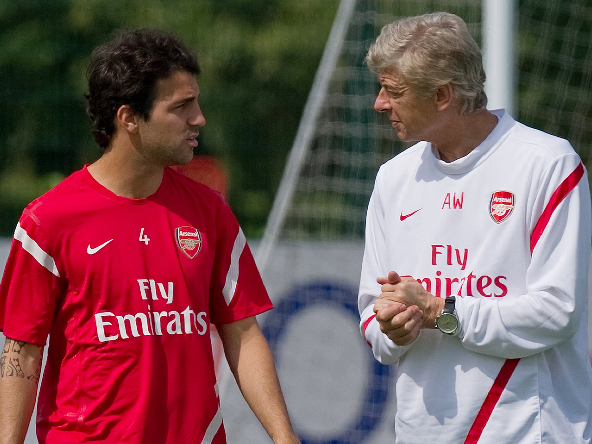 Cesc Fabregas and Arsene Wenger together in 2011
