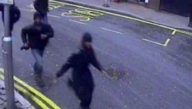 CCTV footage of the group running through Victoria station