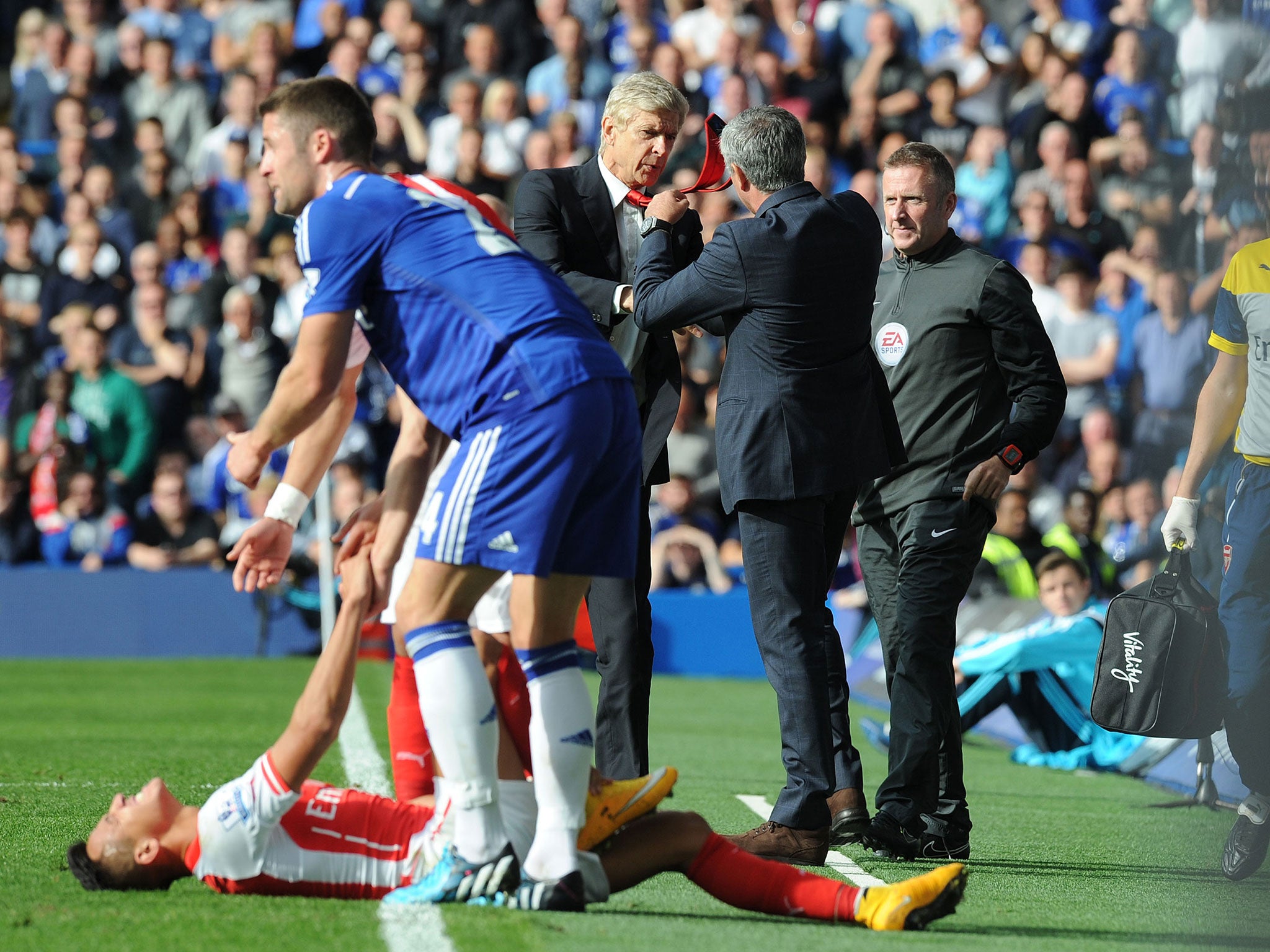 Arsene Wenger and Jose Mourinho clash after Gary Cahill's tackle on Alexis Sanchez