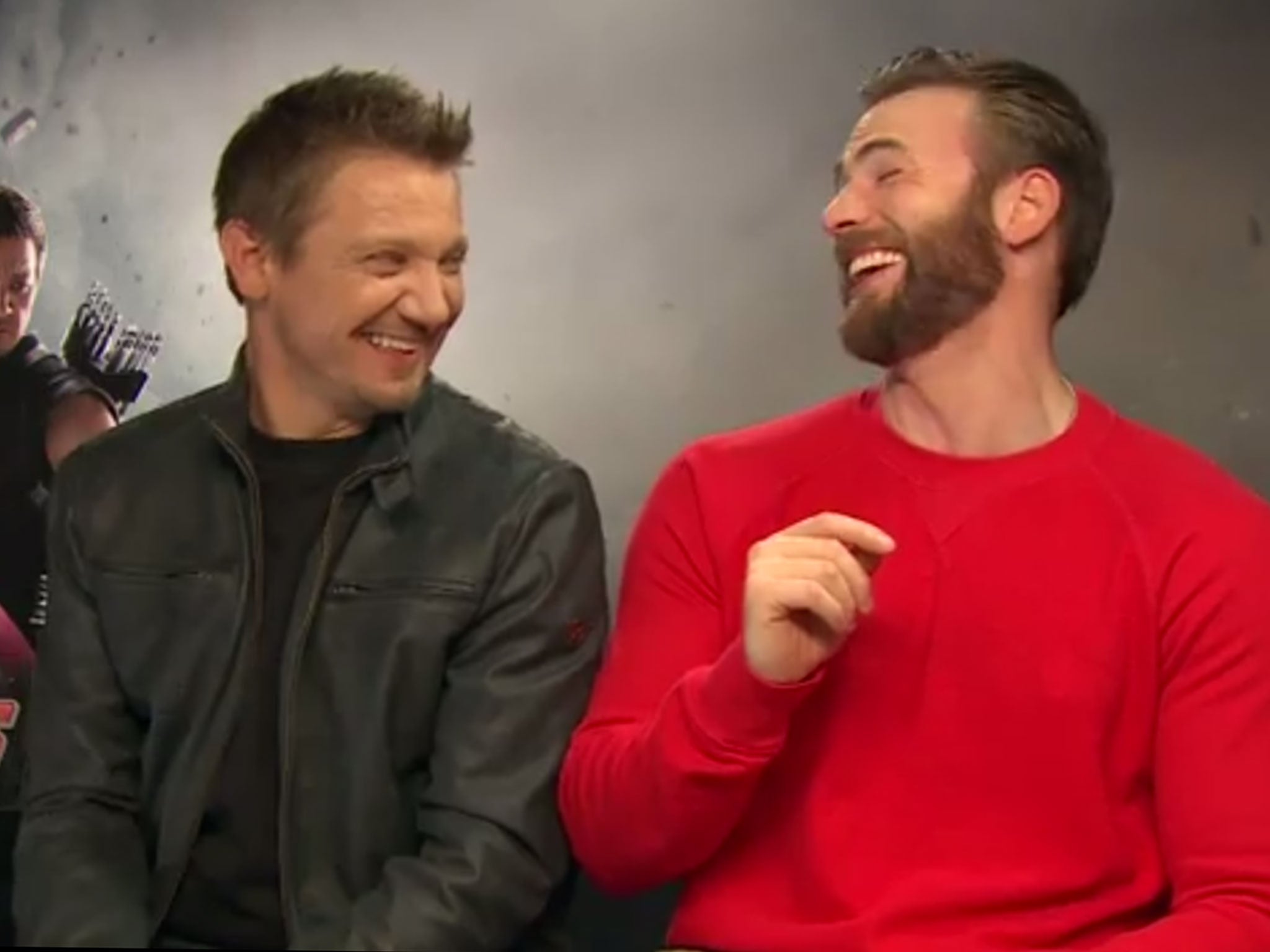 Jeremy Renner and Chris Evans laugh at their Black Widow joke in an Avengers: Age of Ultron interview