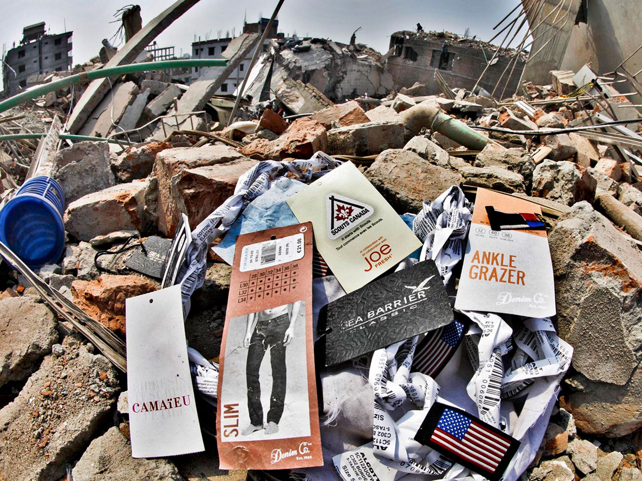 Many of brand tags left abandoned at the site of collapsed Rana Plaza building in Savar, Dhaka © Rashed Shumon