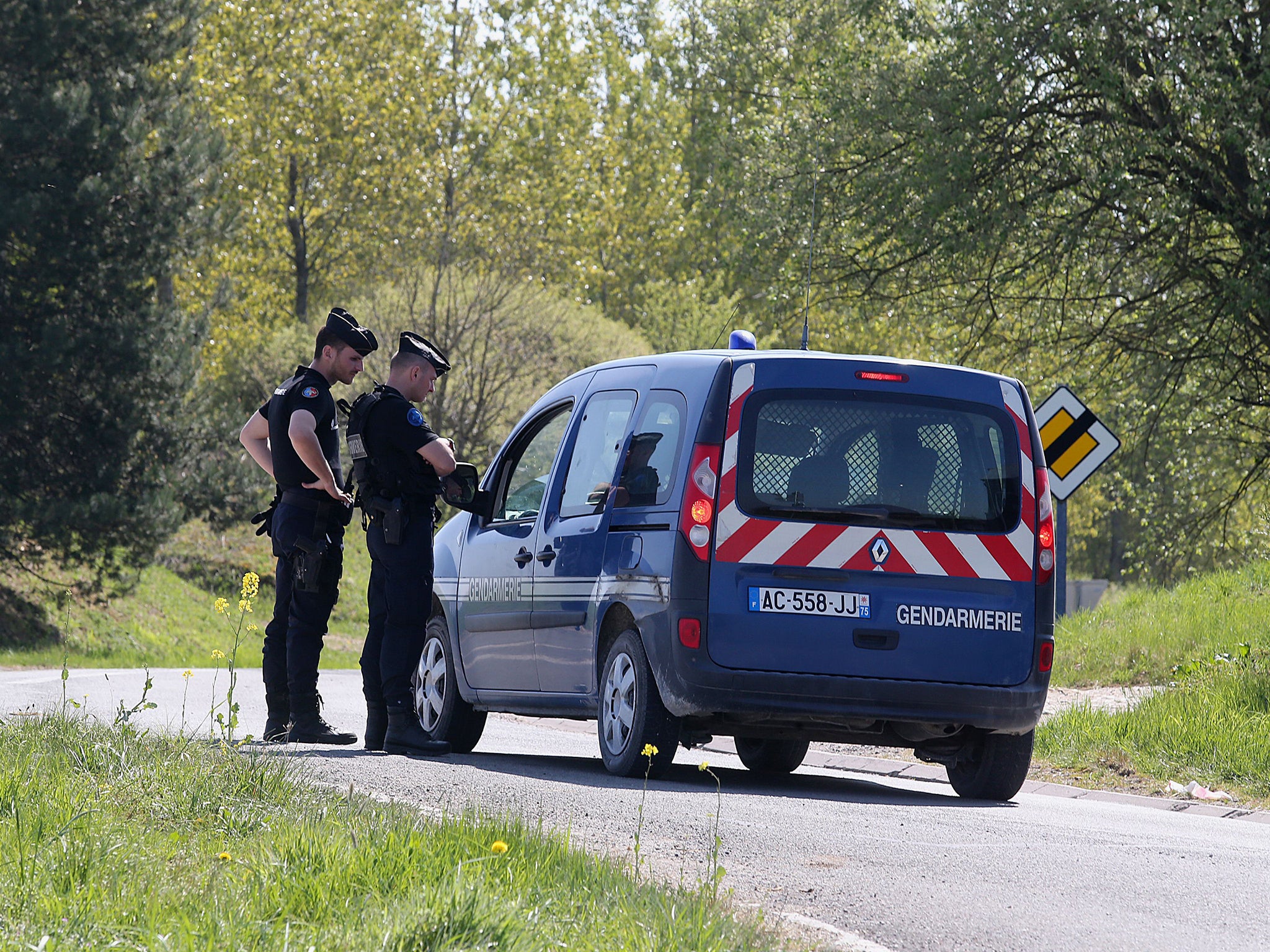Gendarmes take part in research operations in the area of Grandpre, east of Reims, looking for the alleged kidnapper of 7-year-old girl Berenyss who was abducted on 23 April in Sancy, northeastern France, and found safe 8 hours later in Grandpre, some 120