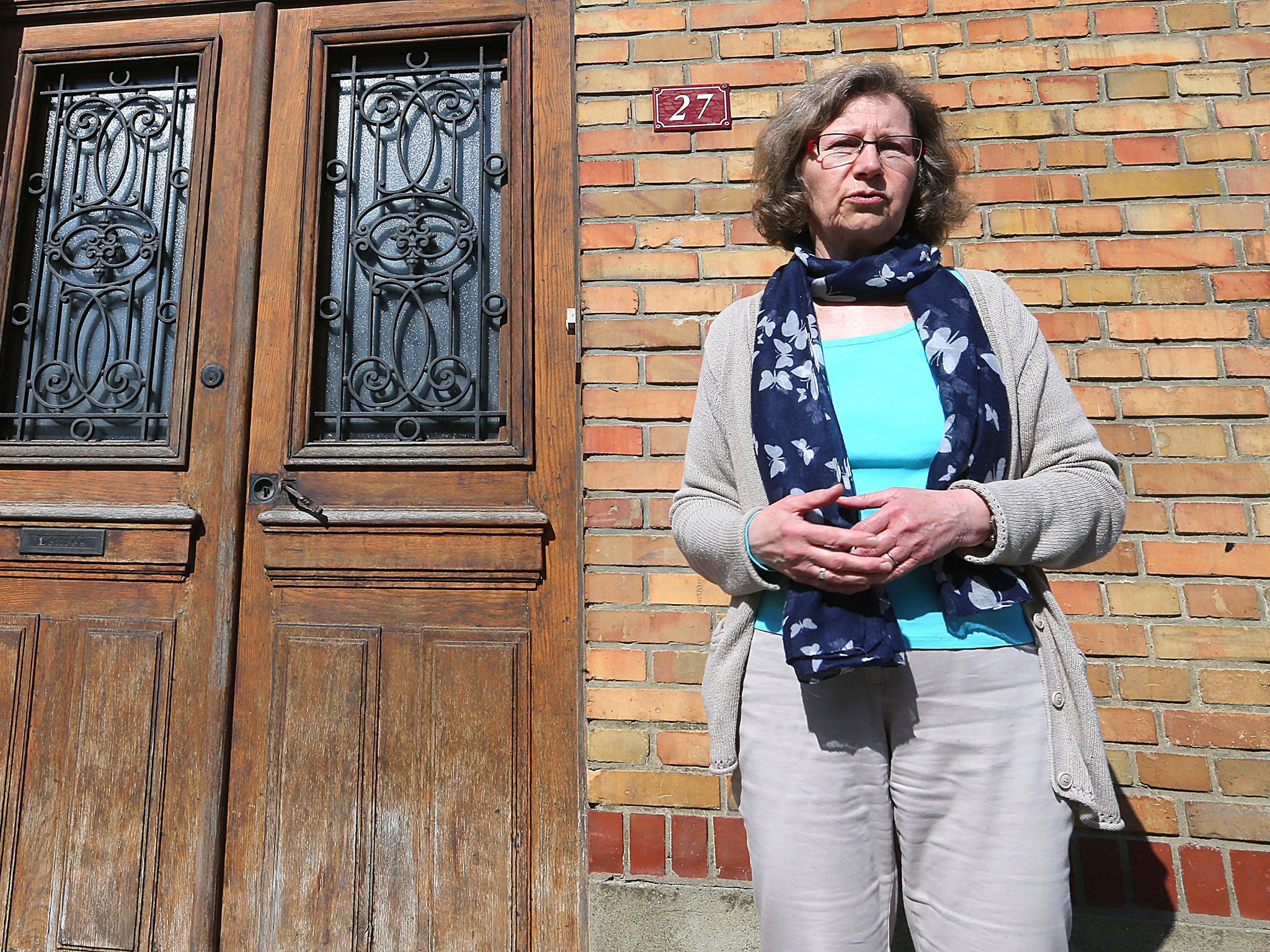 General Practitioner Marie-Alix Lambert outside her home in Grandpre, on April 24, 2015, where 7-year-old girl Berenyss, who was abducted on April 23 in Sancy, northeastern France, was found safe 8 hours later, some 120 kilometers away.