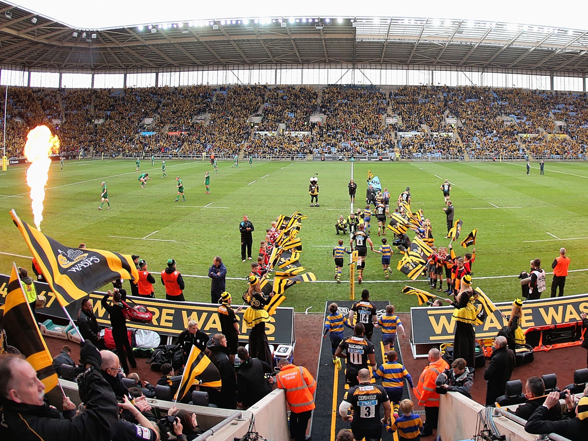 The Wasps team run on to the pitch for their first game at the Ricoh Arena, against London Irish, in December