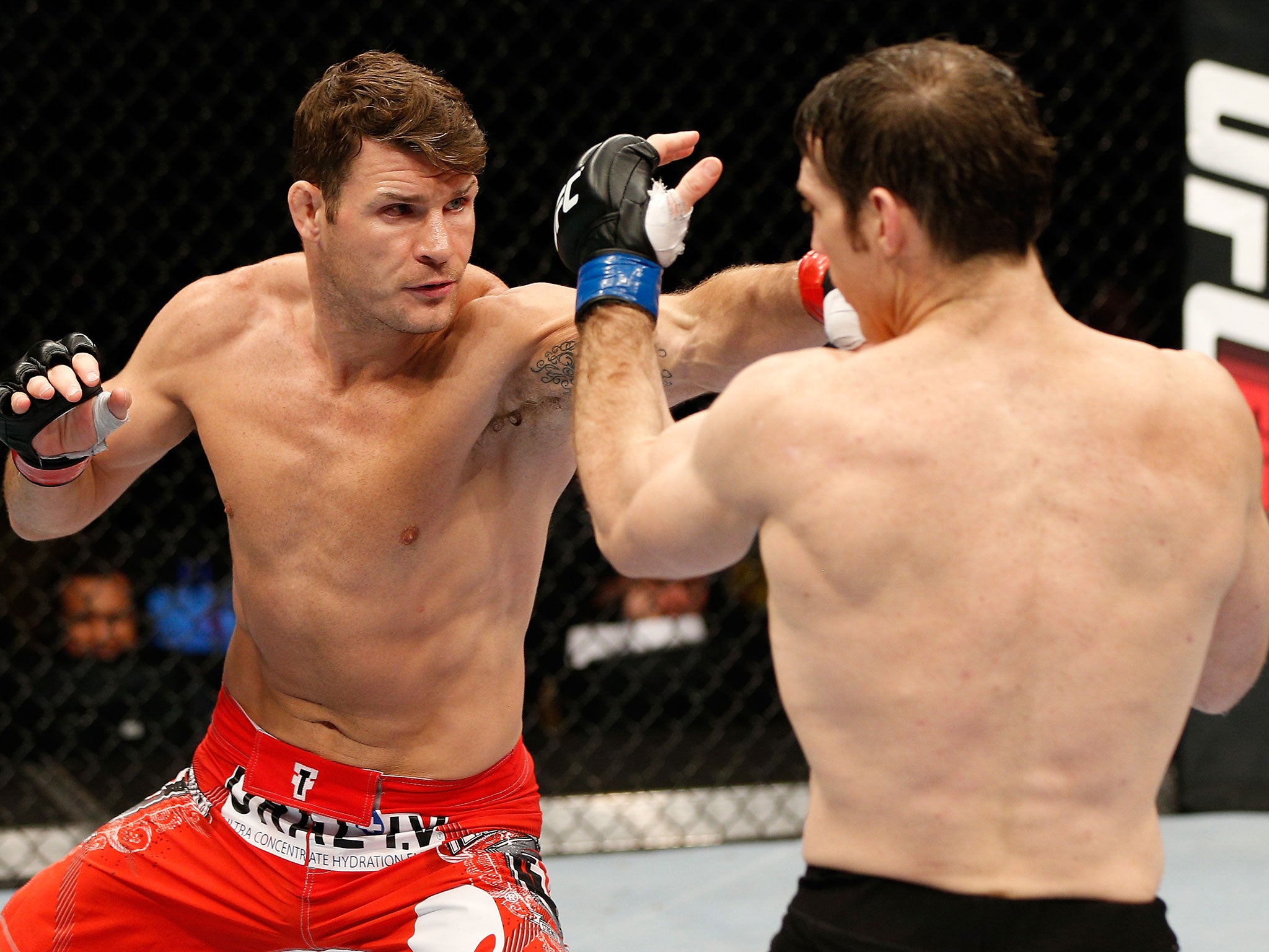 Michael Bisping punches Tim Kennedy