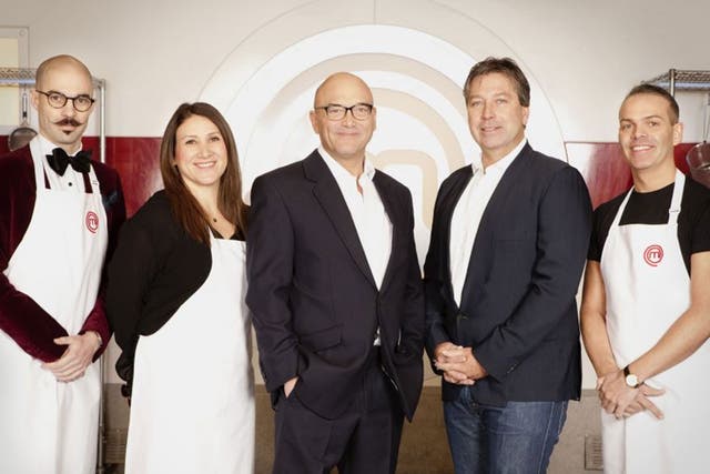 Masterchef cooks Tony Rodd (left), Emma Spitzer (second left) and
Simon Wood (right) posing with judges Gregg Wallace (centre) and John Torode (second right).